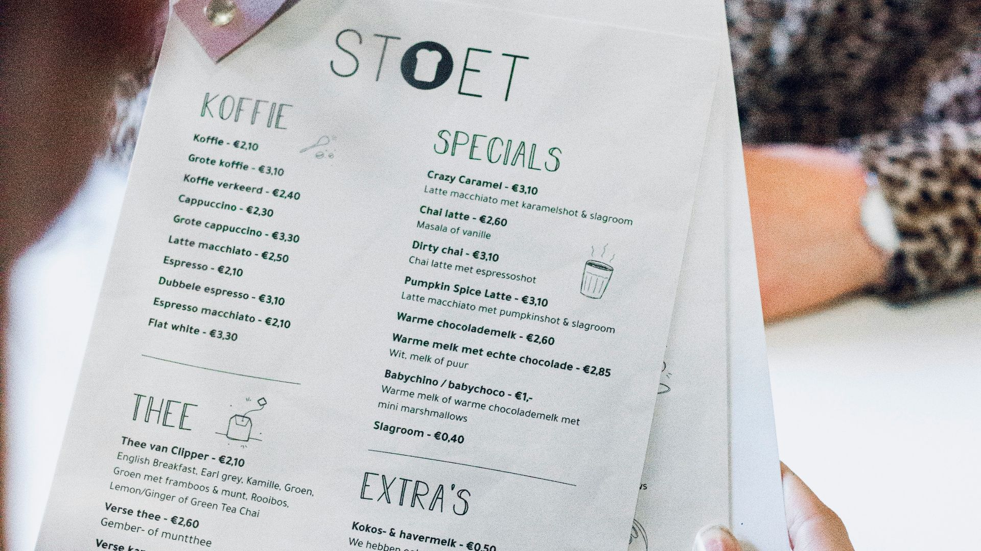 person holding white printer paper