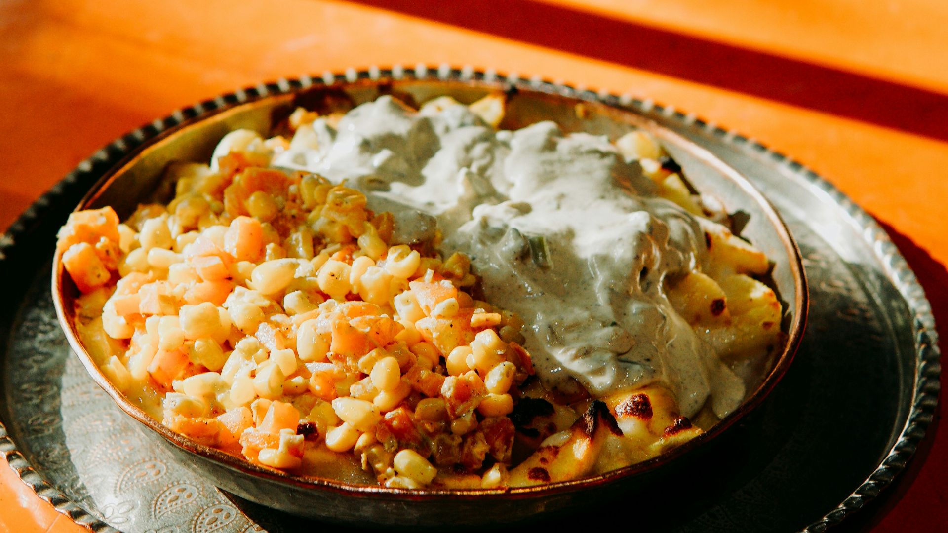 a bowl of macaroni and cheese on a table