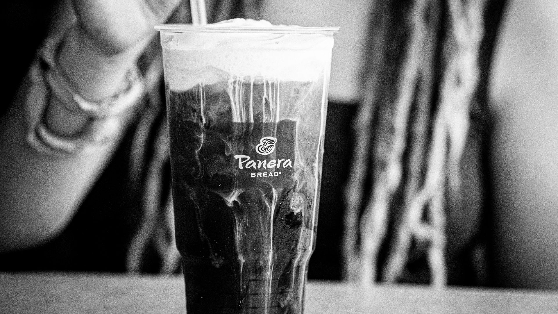 grayscale photo of clear drinking glass