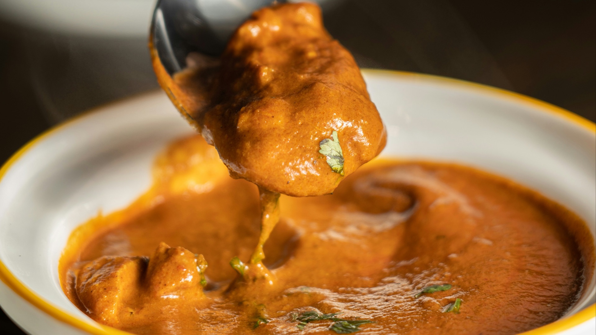 orange mushy dish in bow