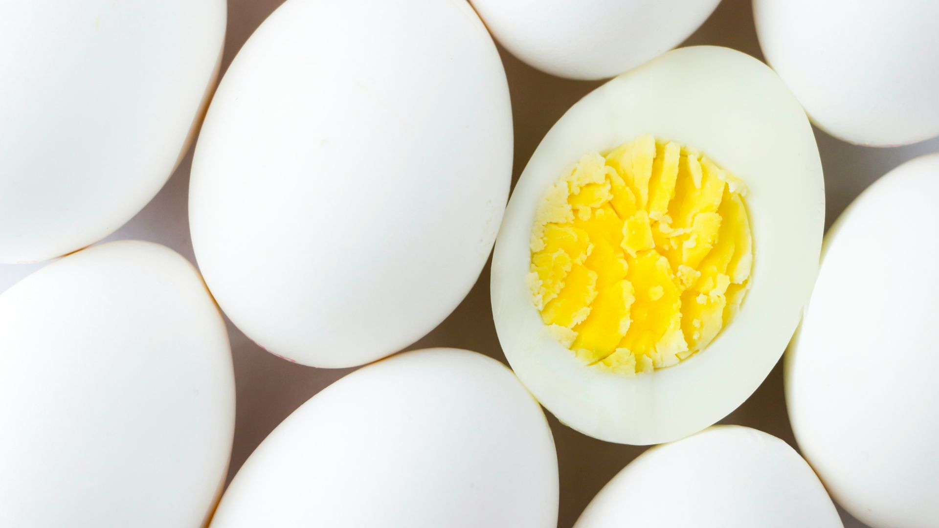 white egg lot on brown wooden table