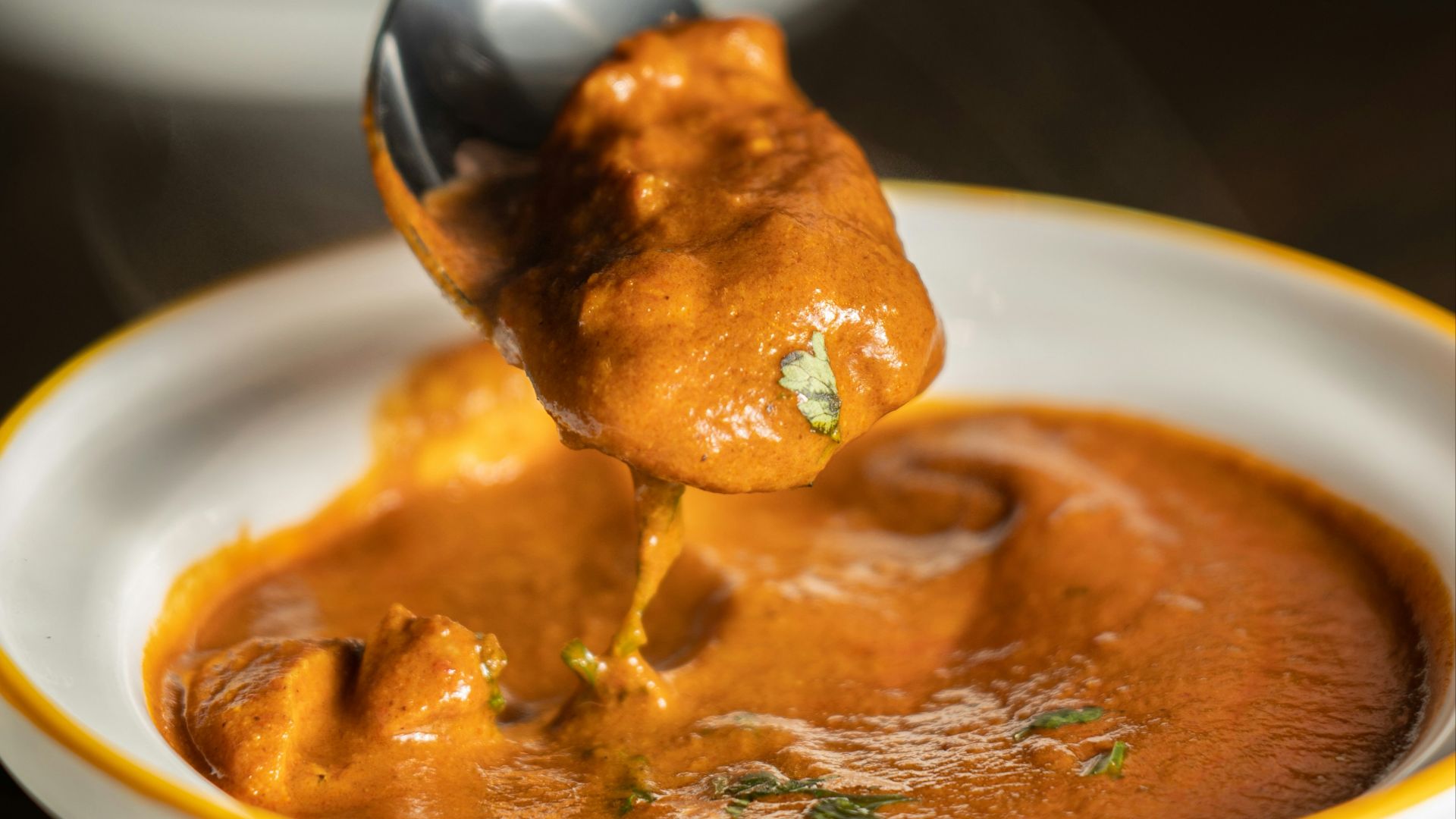 orange mushy dish in bow