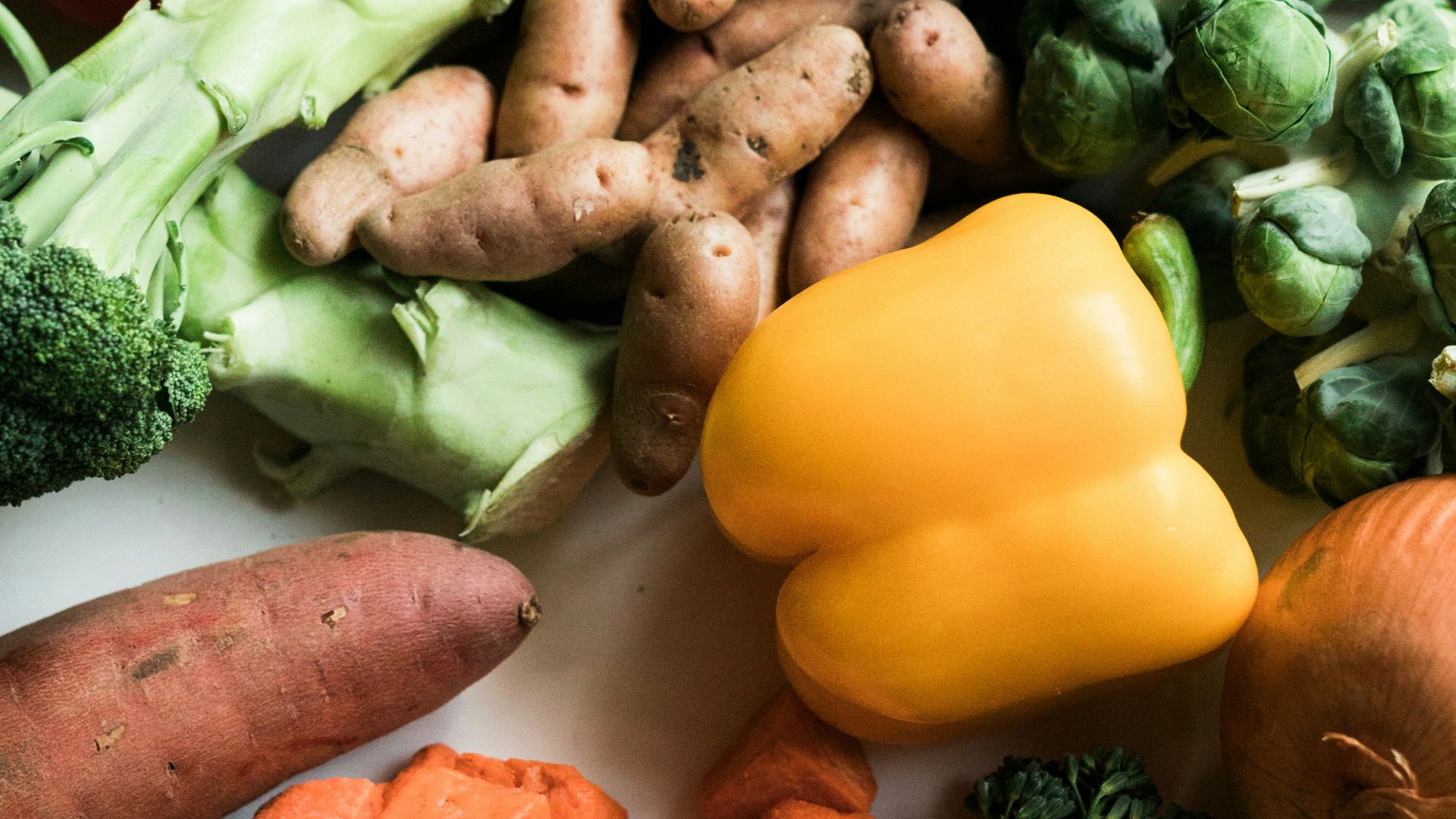 sliced carrots and green vegetable