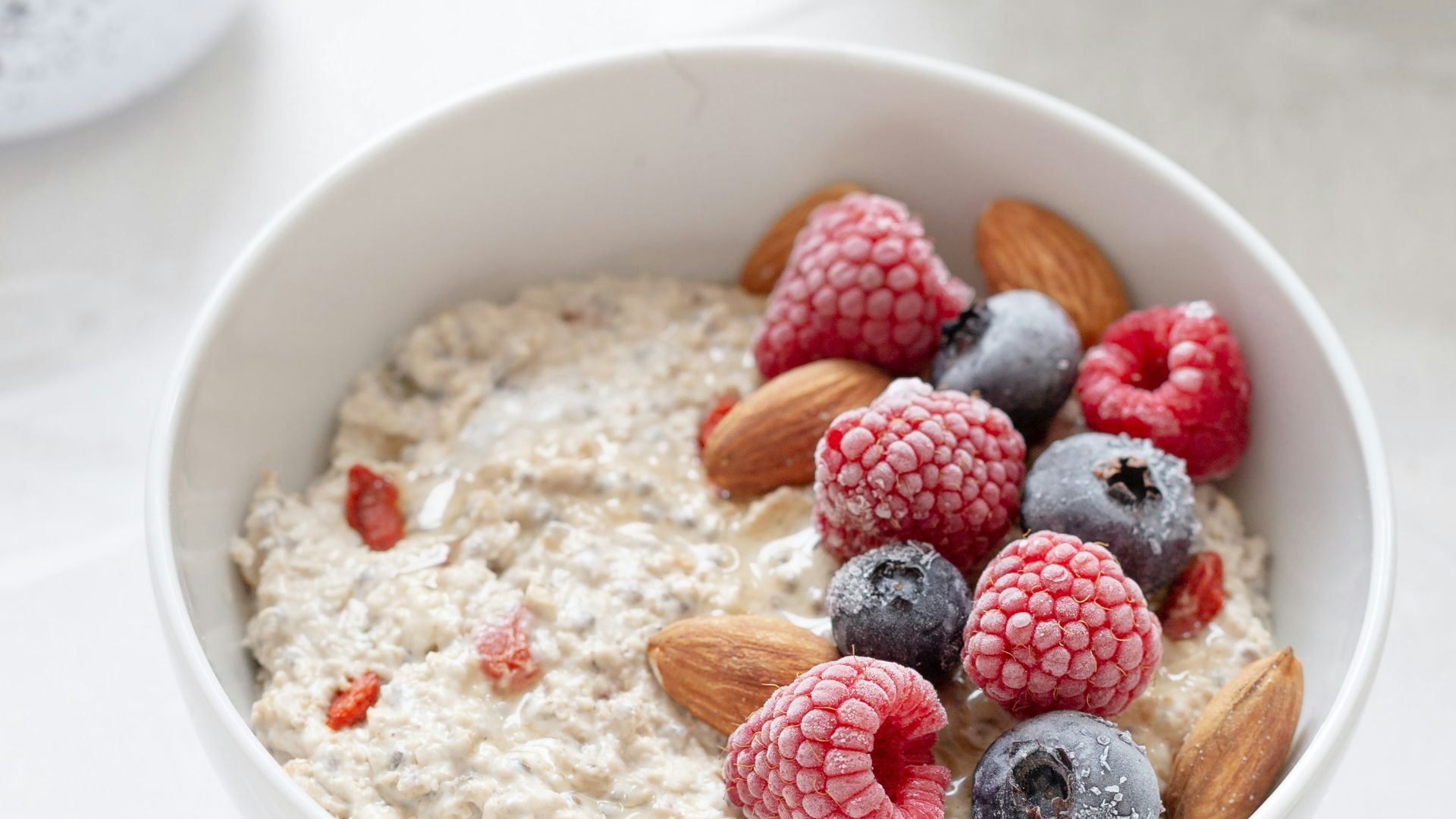 strawberries in white ceramic bowl