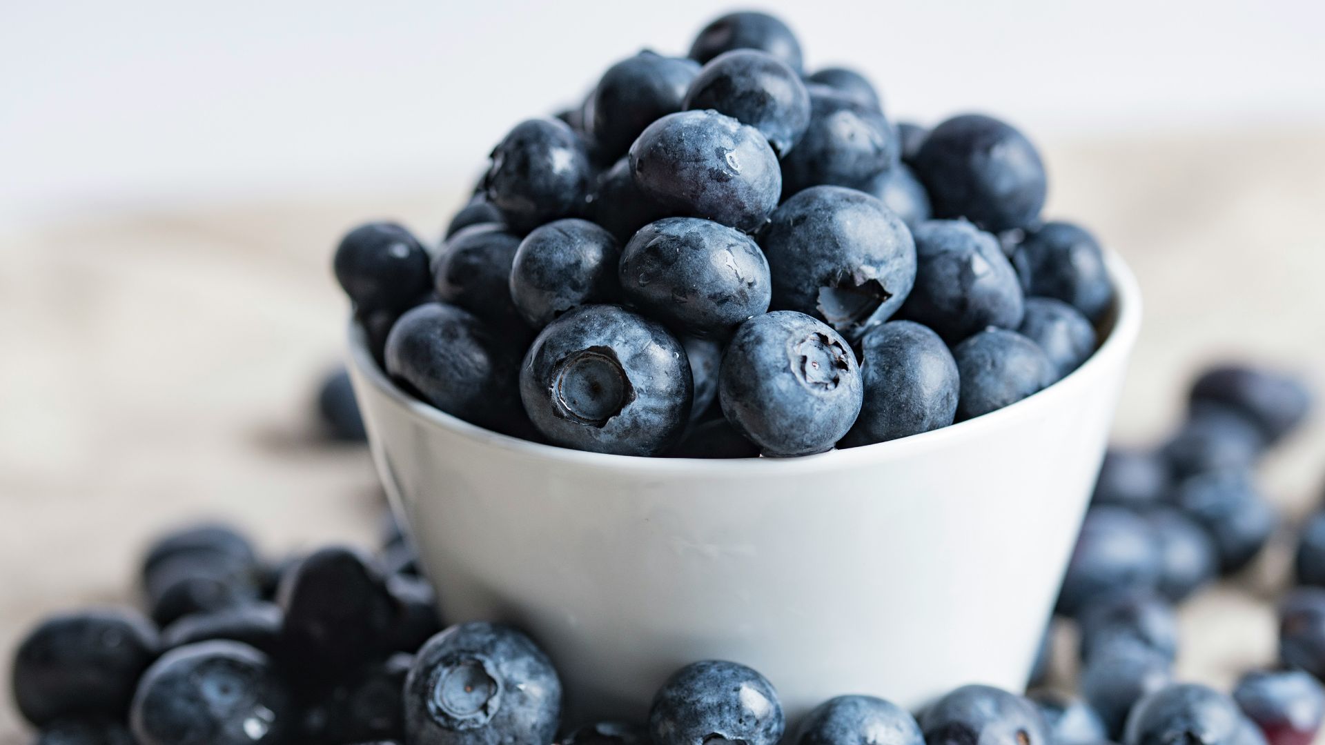 blueberries on white ceramic container