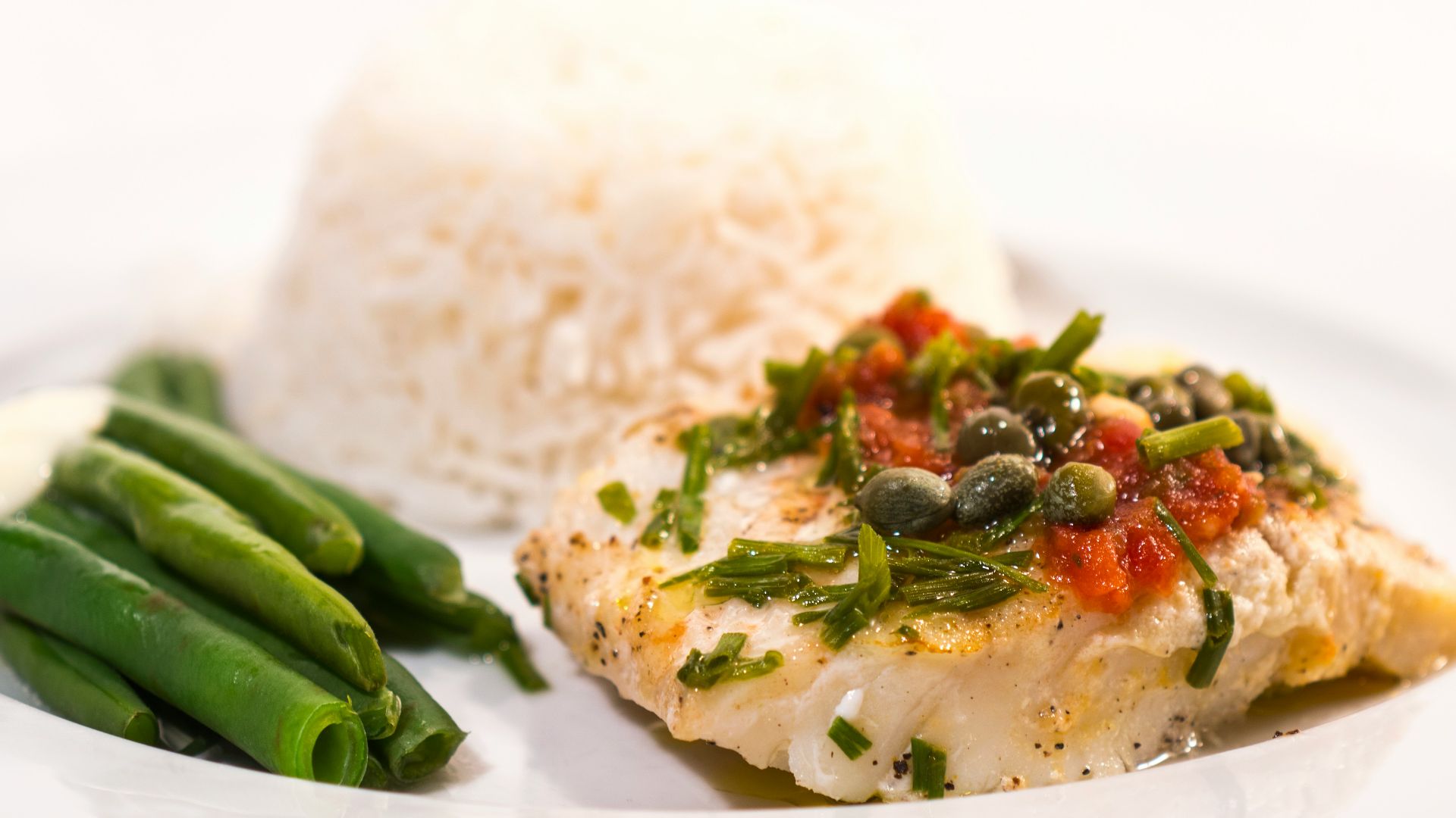 green beans on white ceramic plate
