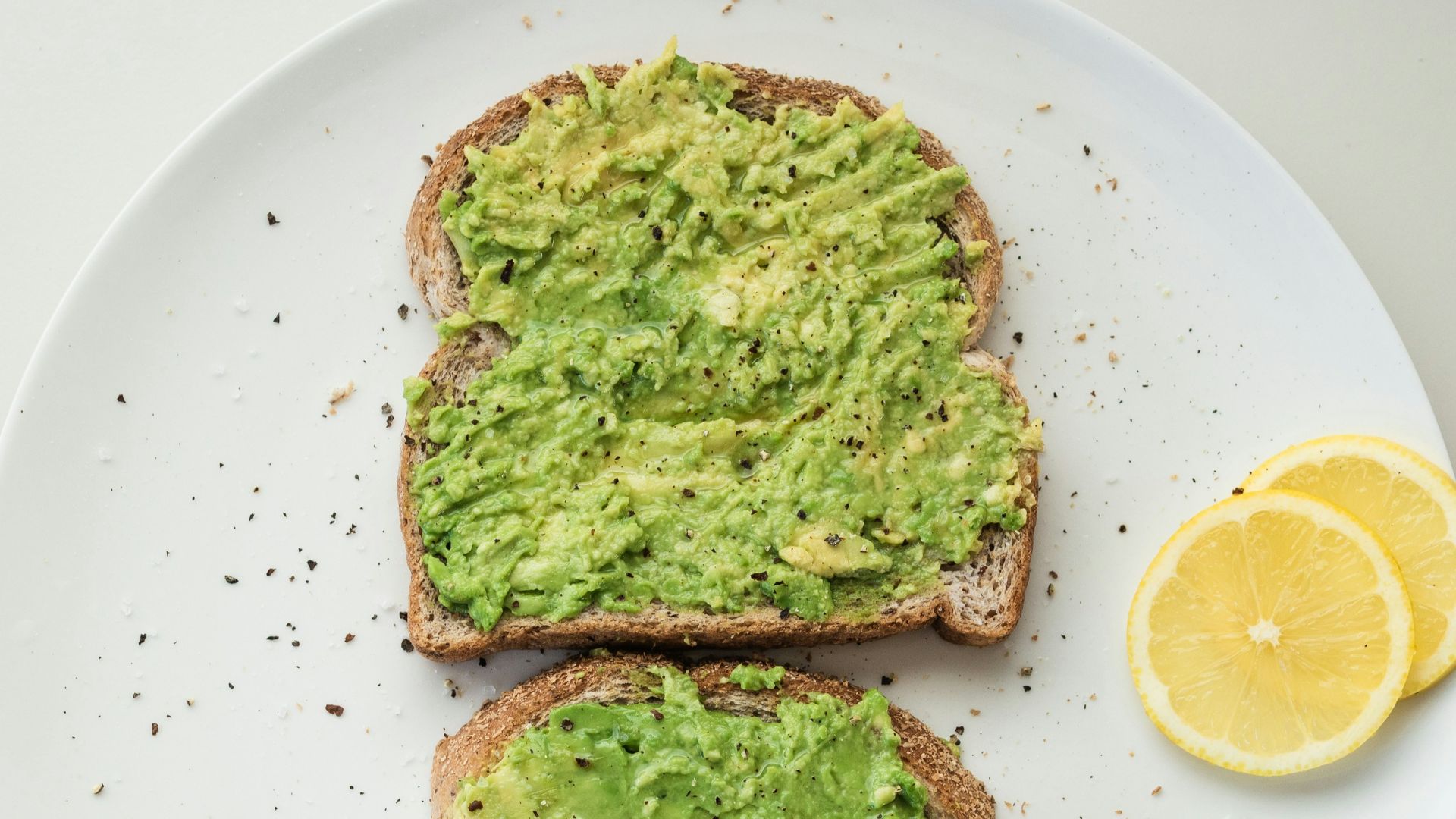 green and brown vegetable on white ceramic plate