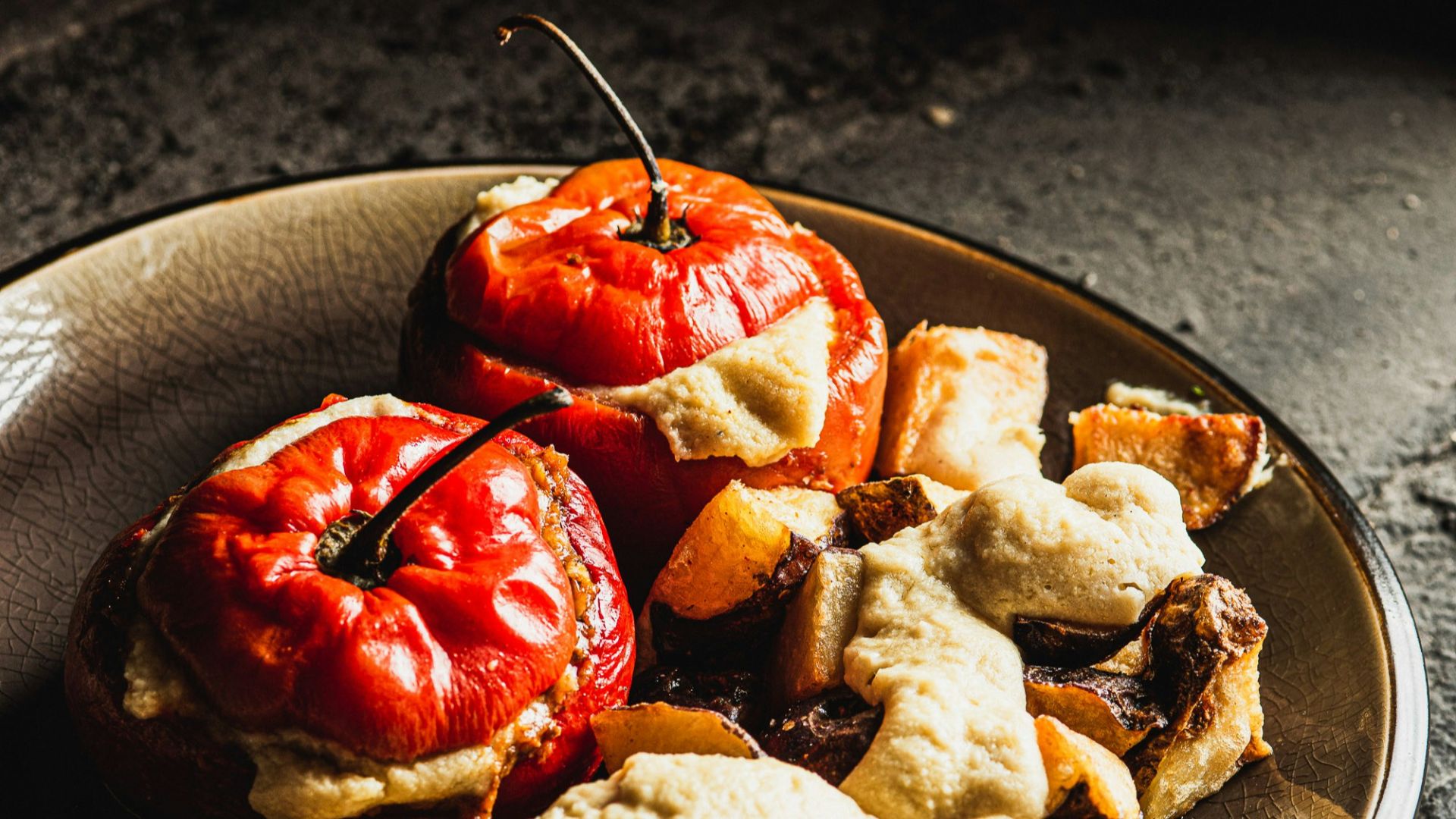 Baked apples stuffed with filling on a plate