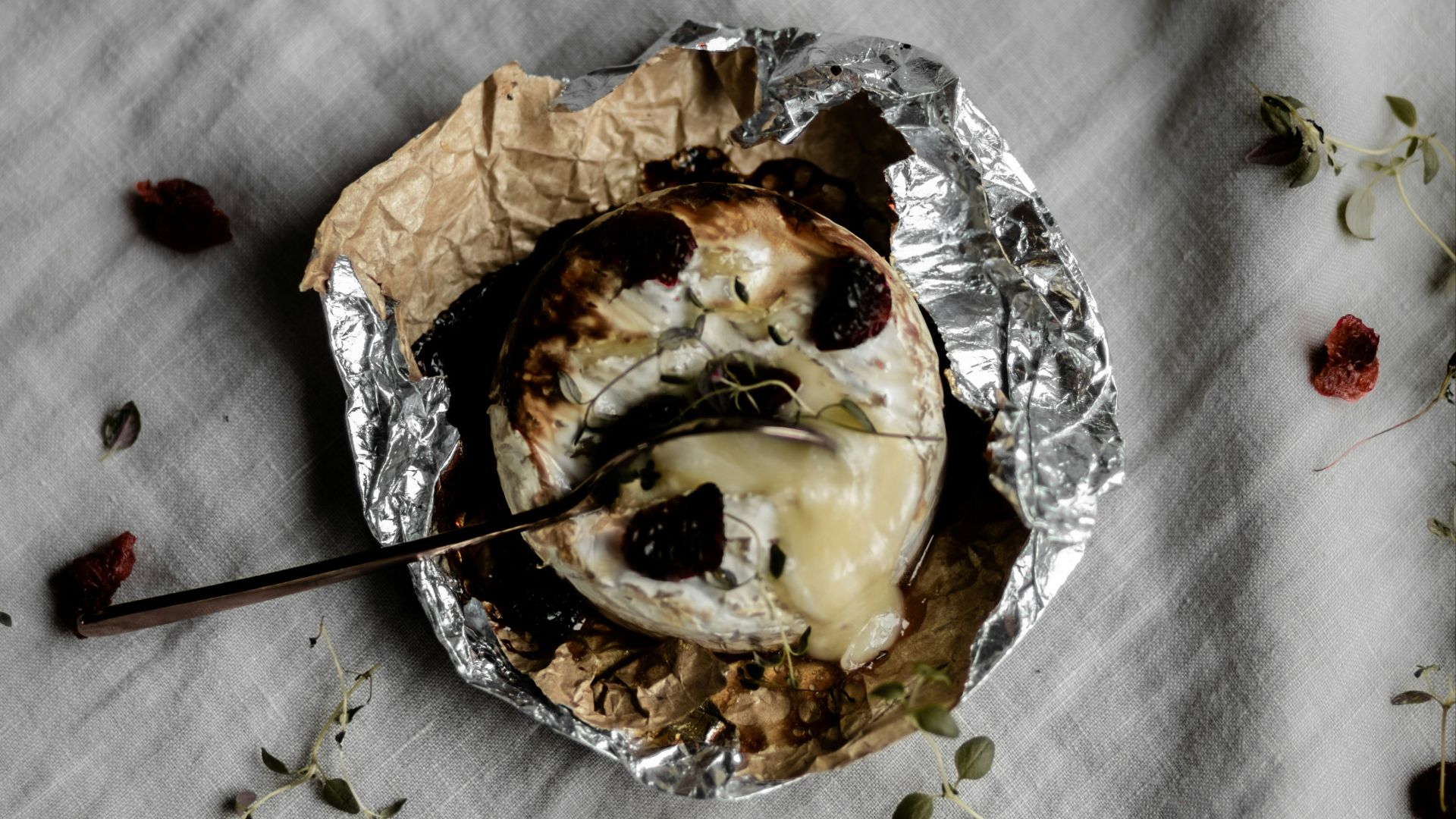 brown and white pastry on white textile
