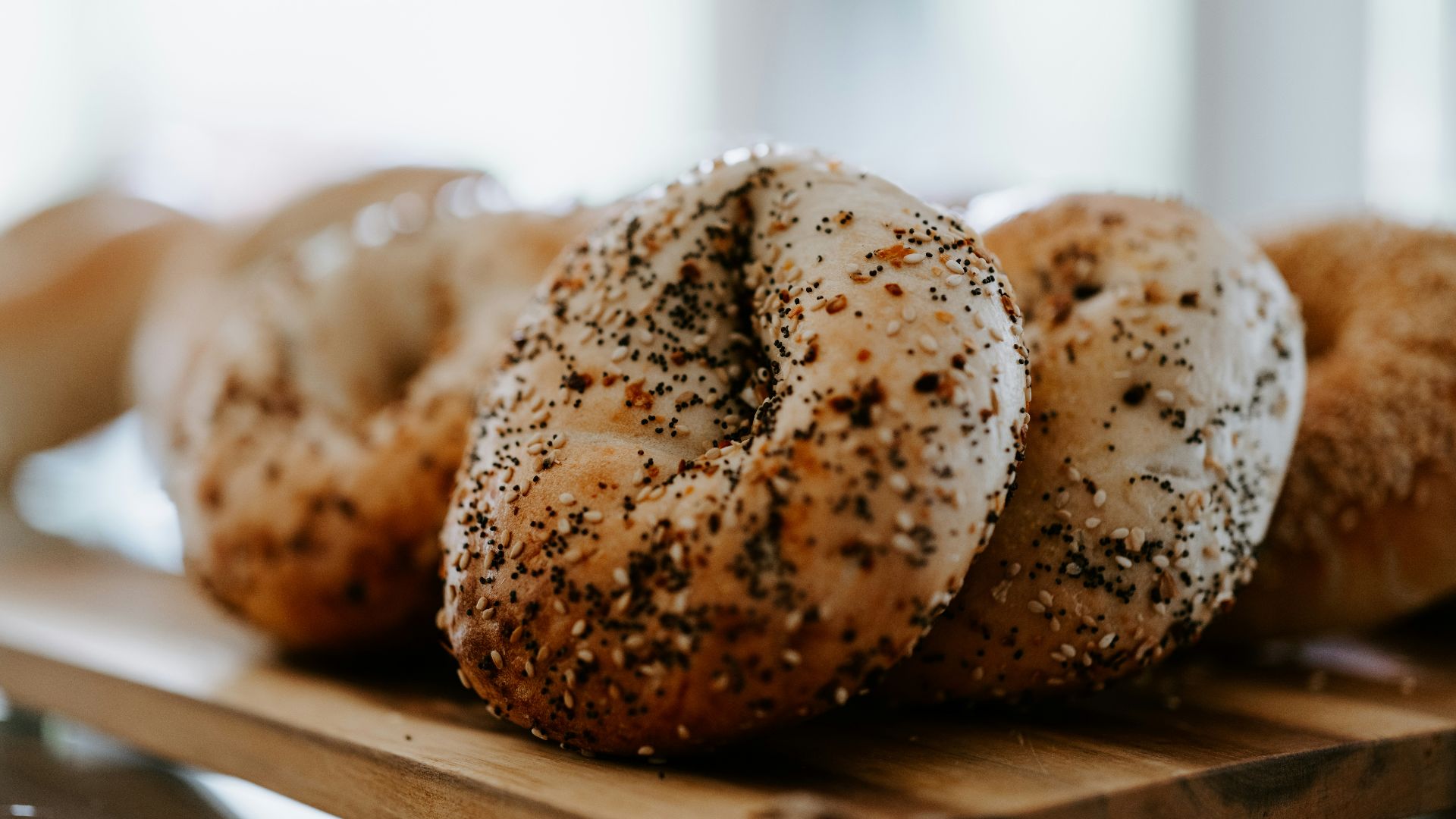 a close up of a tray of bagels