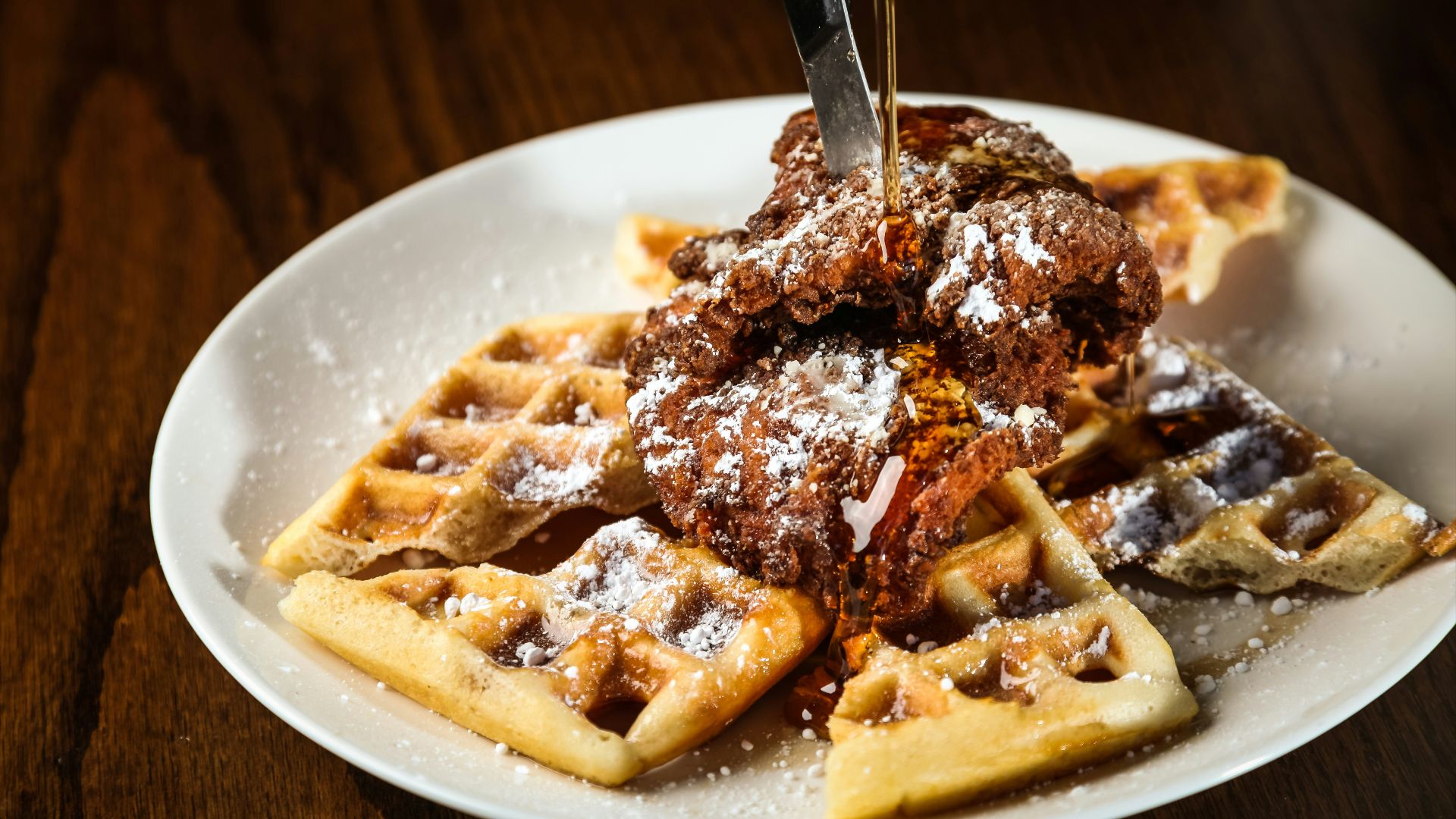 pasta with chocolate syrup on white ceramic plate