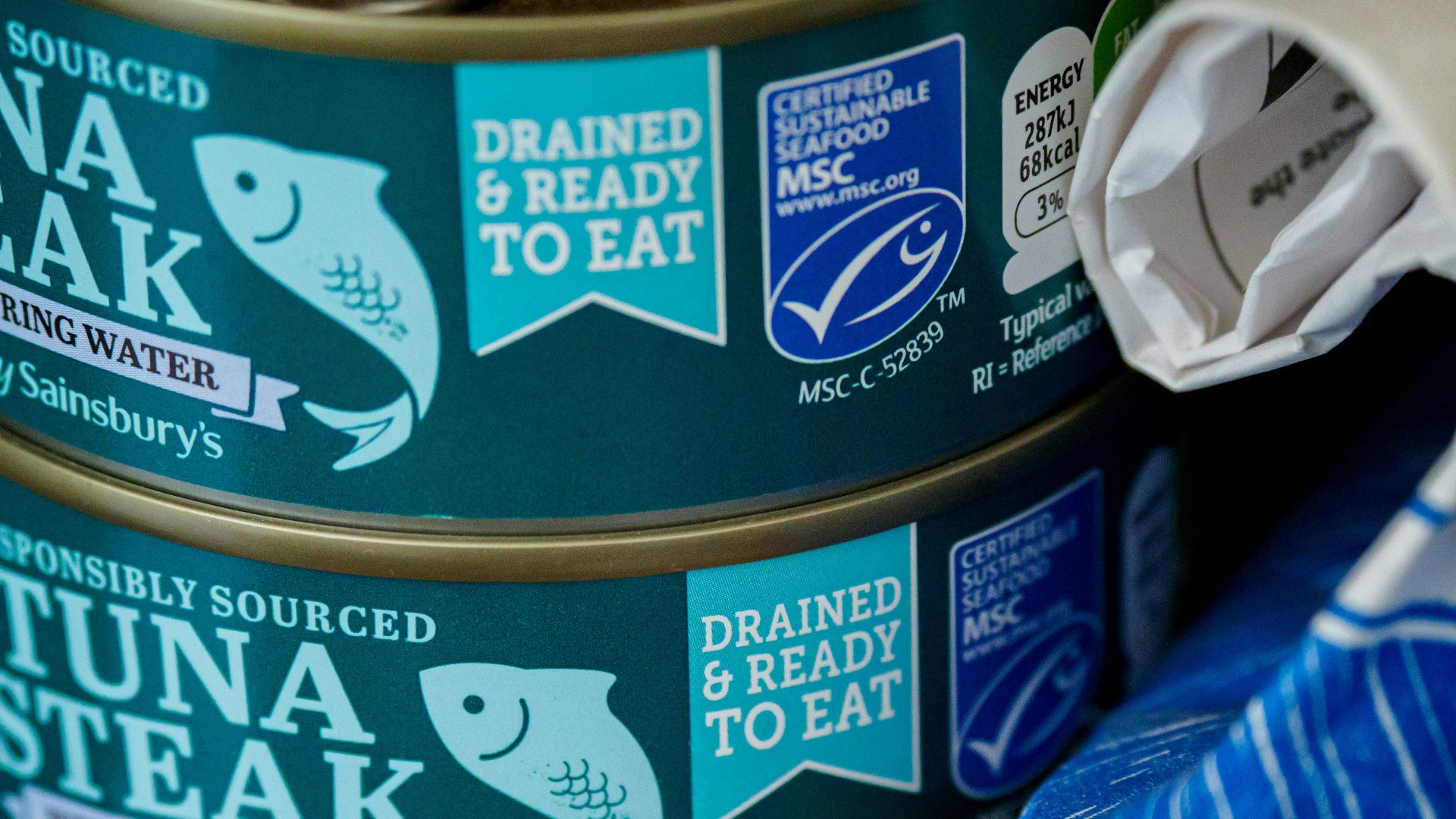 blue and white labeled can