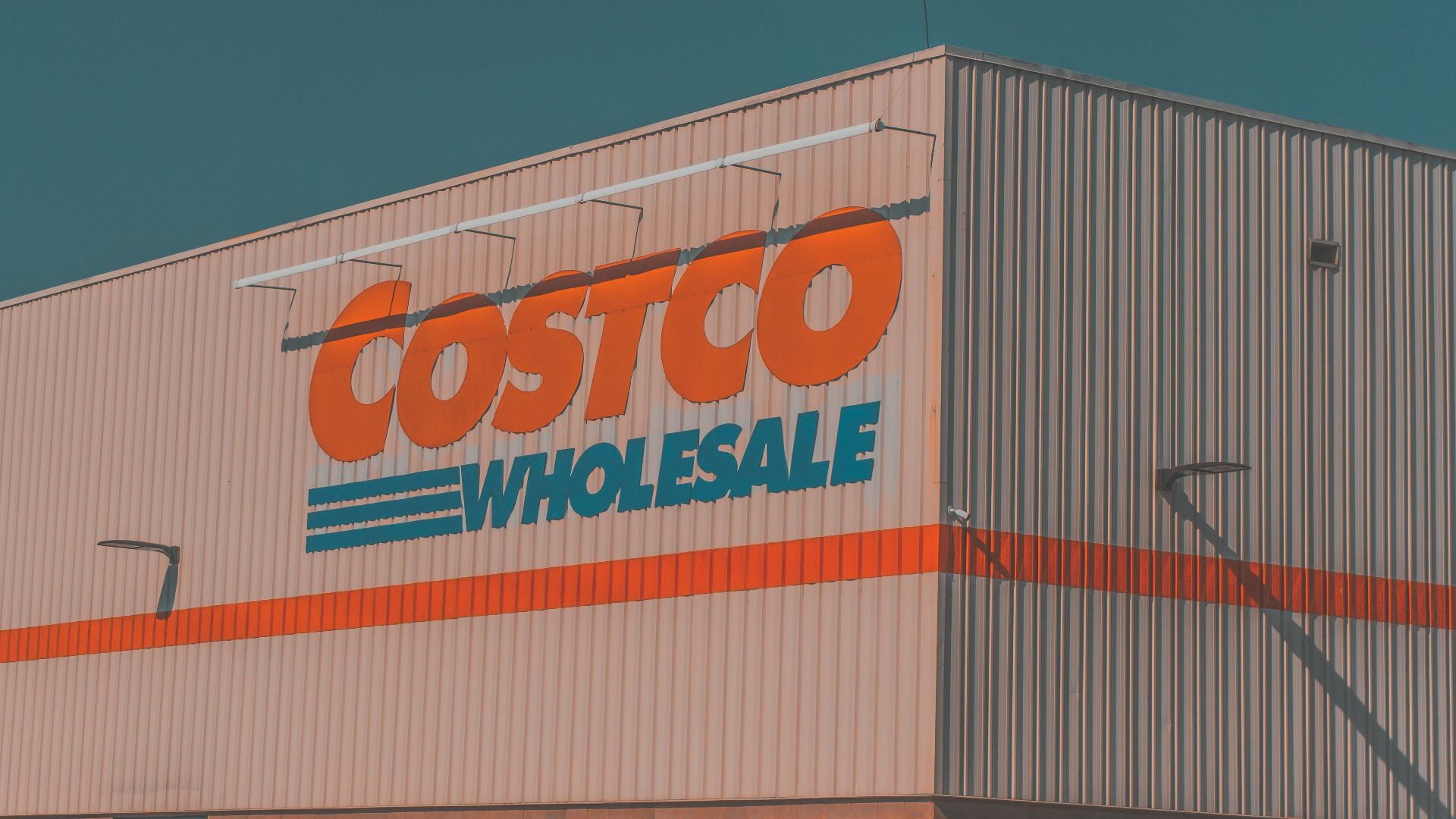 a building with a sign that says costco whole sale