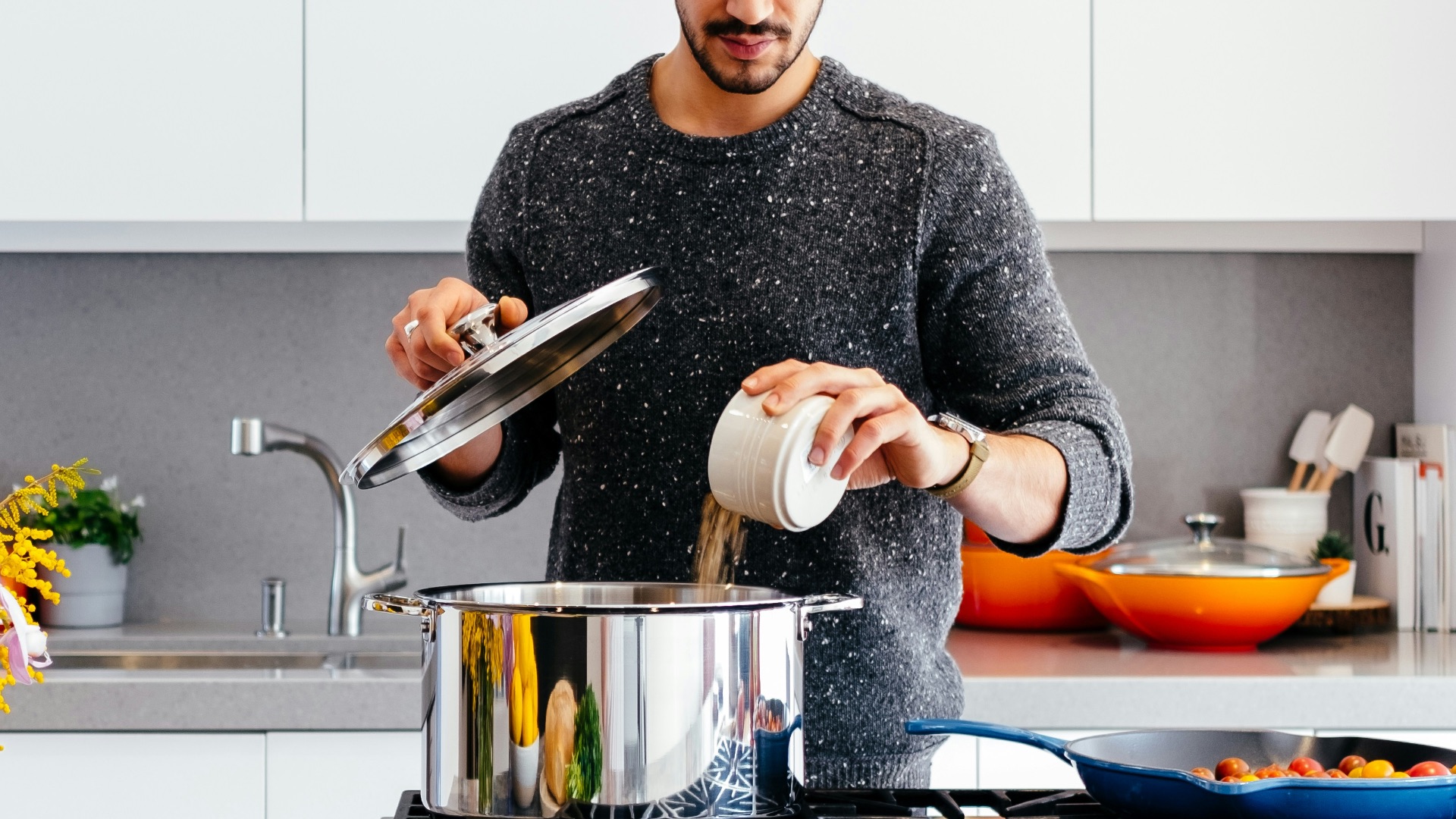 man standing inside kitchen room