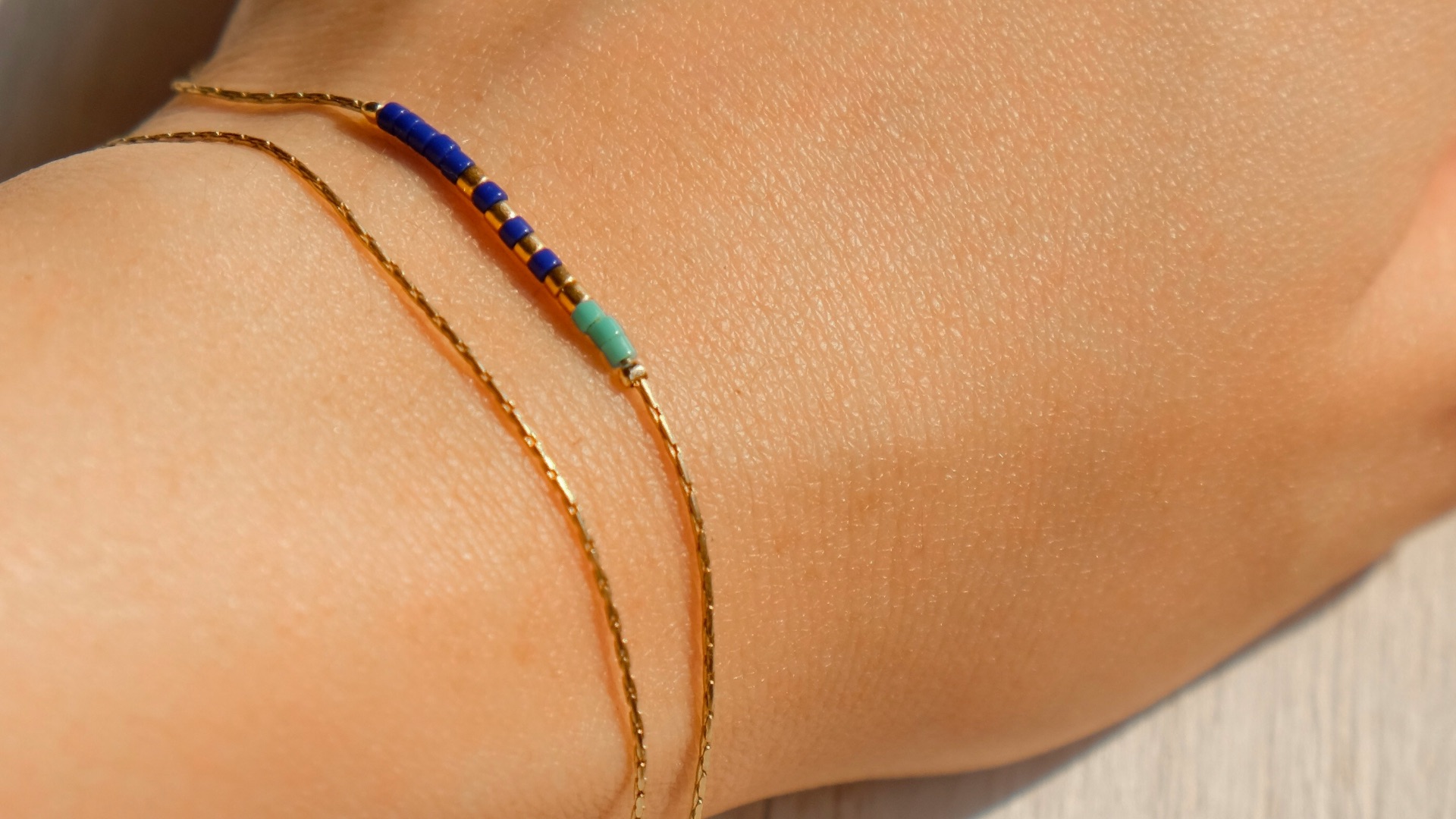 gold-colored bracelet