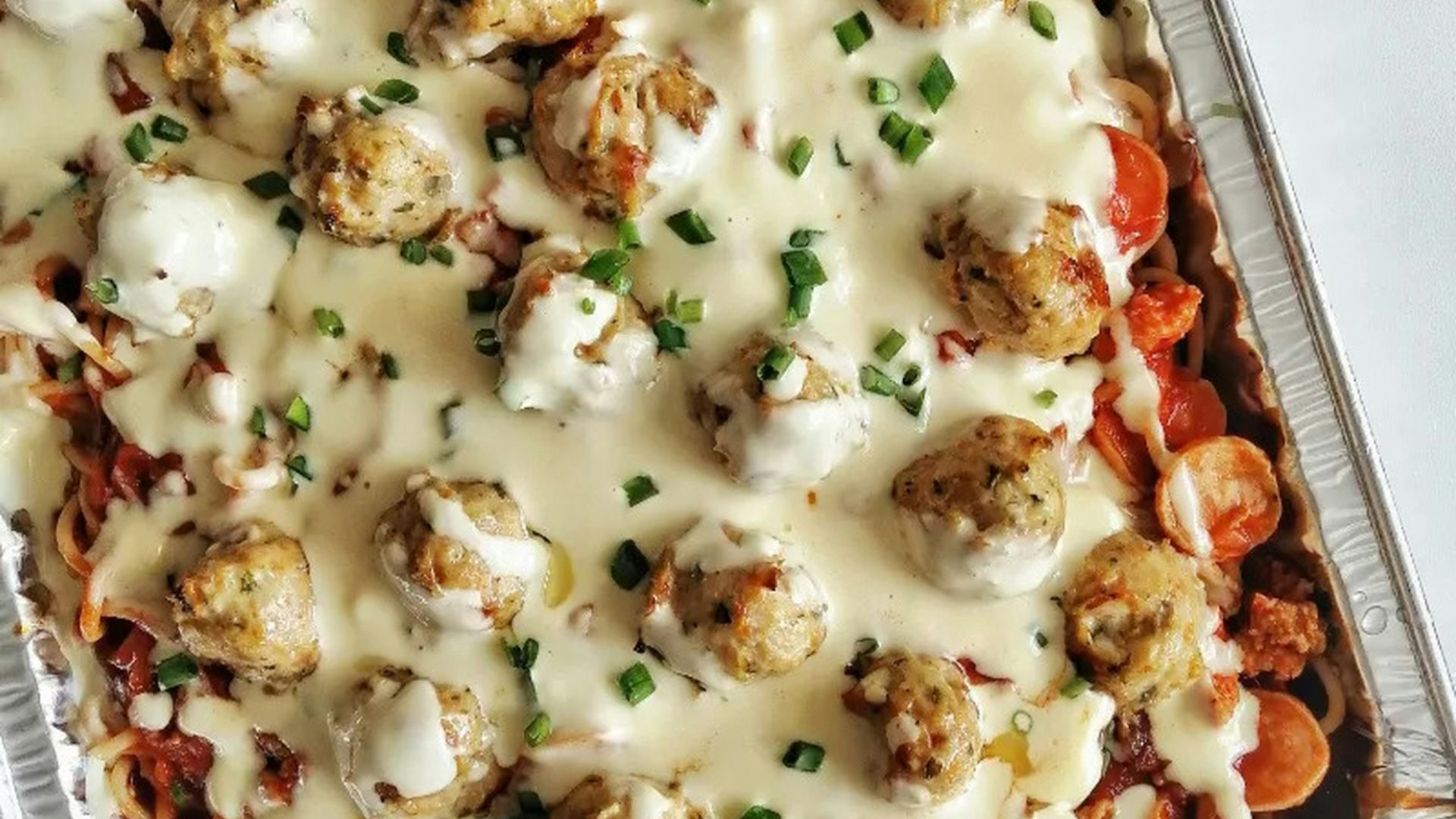 white and brown dish on silver tray