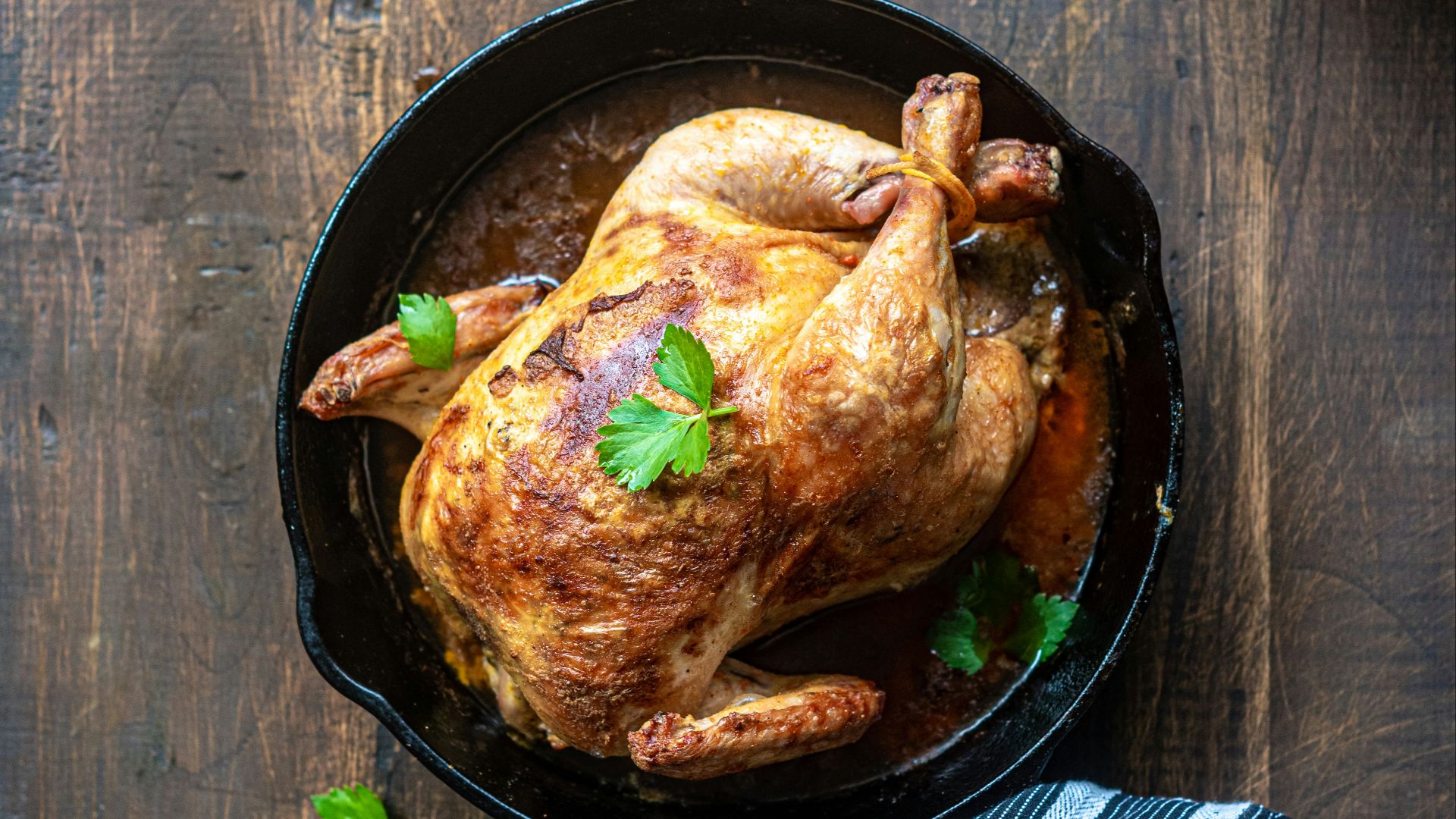 chicken on black round plate
