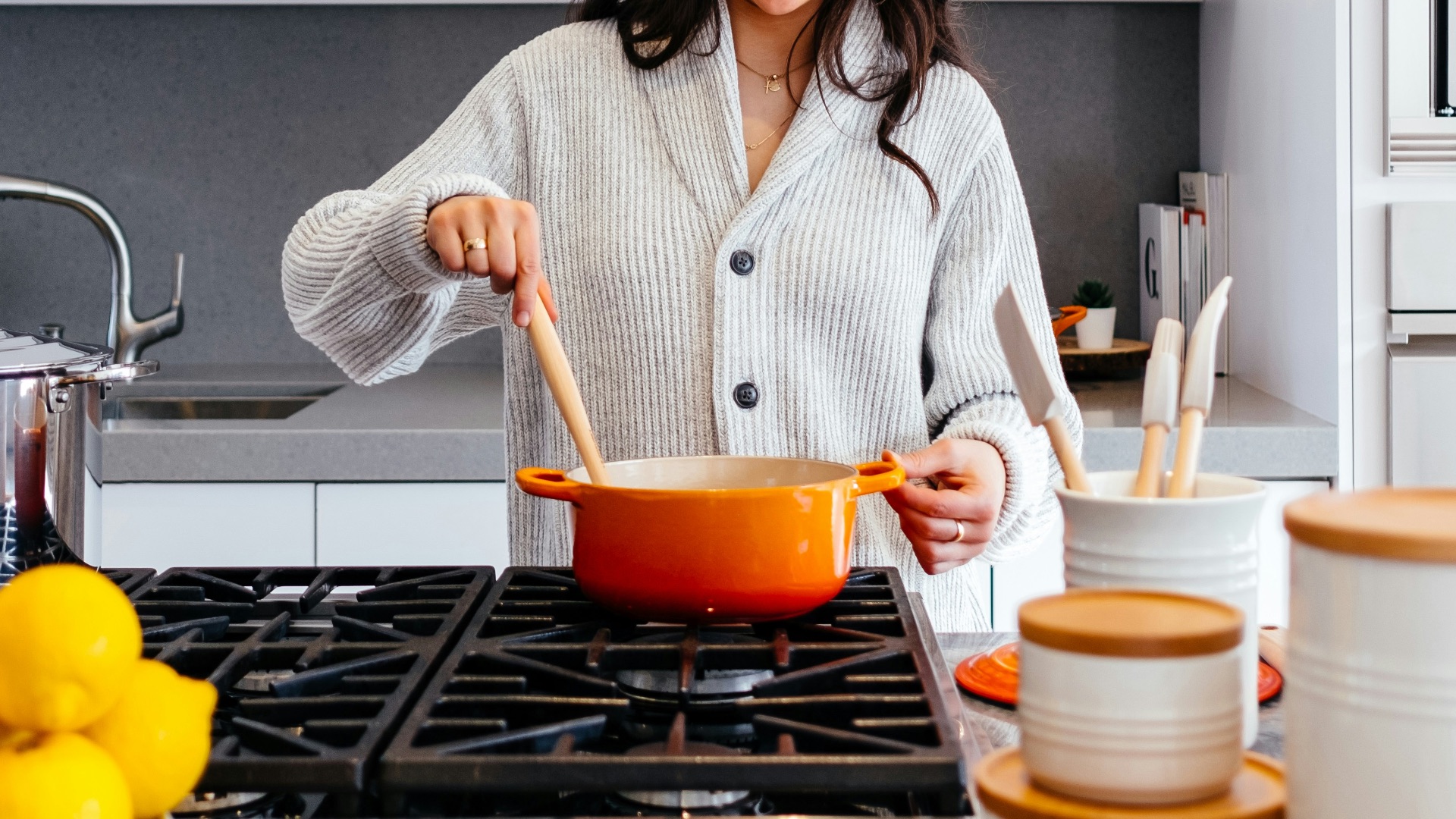 woman cooking inside kitchen room