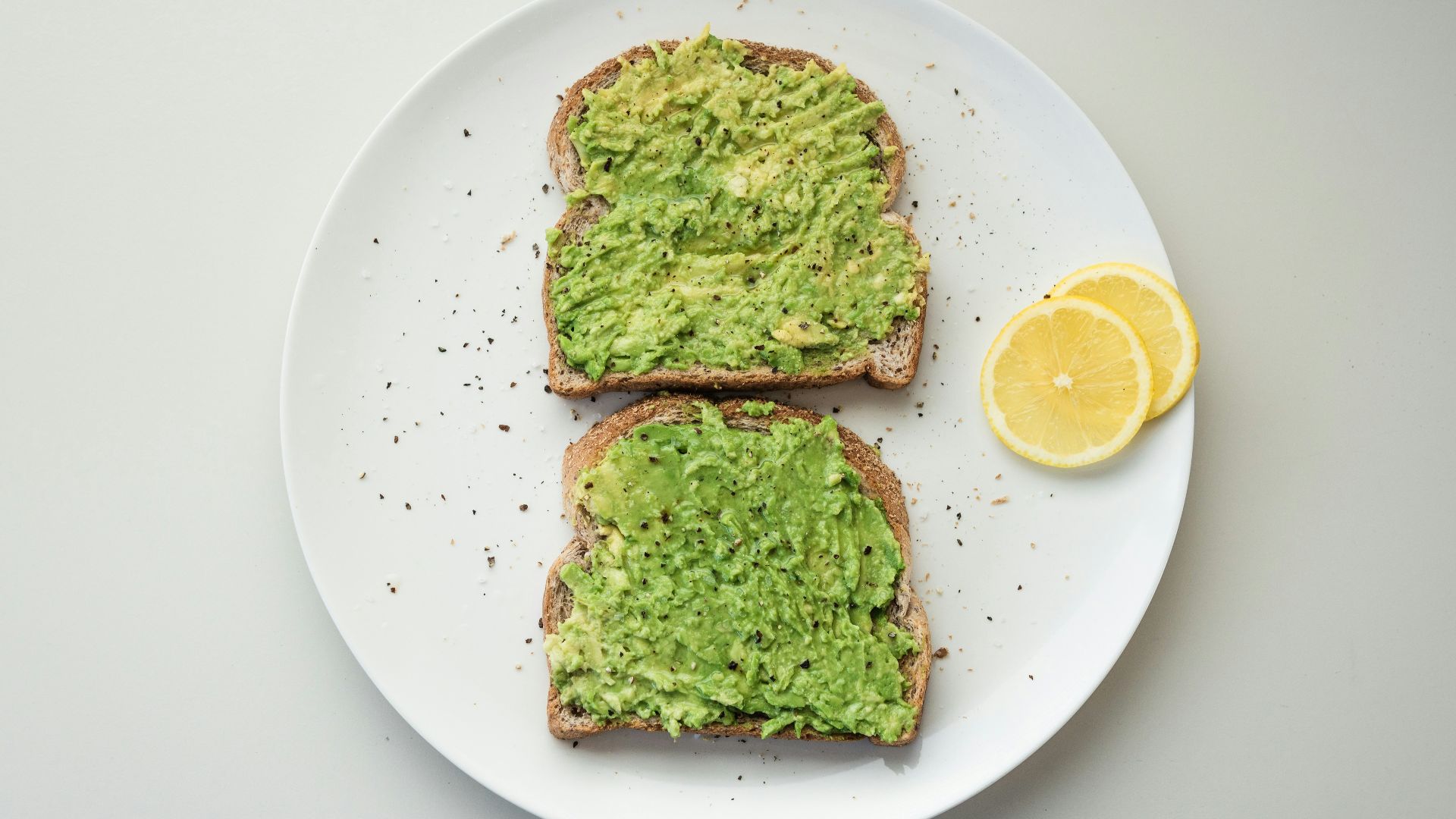 green and brown vegetable on white ceramic plate