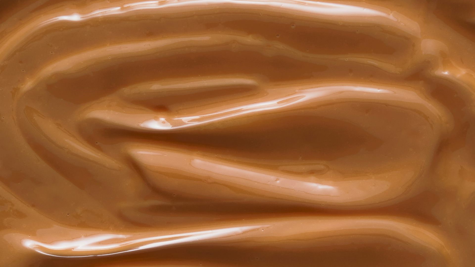 A close up of a chocolate frosted surface