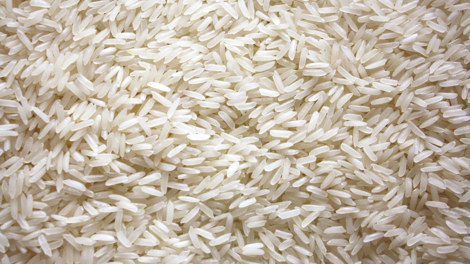 a pile of white rice sitting on top of a table