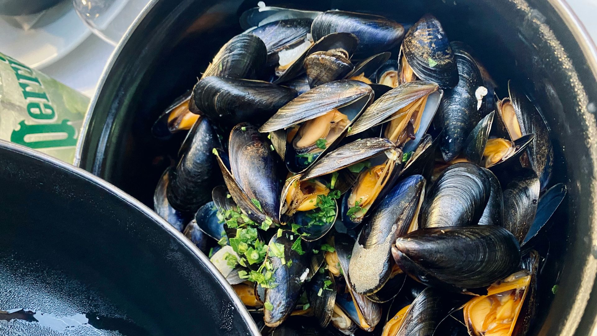 black fish on black round container