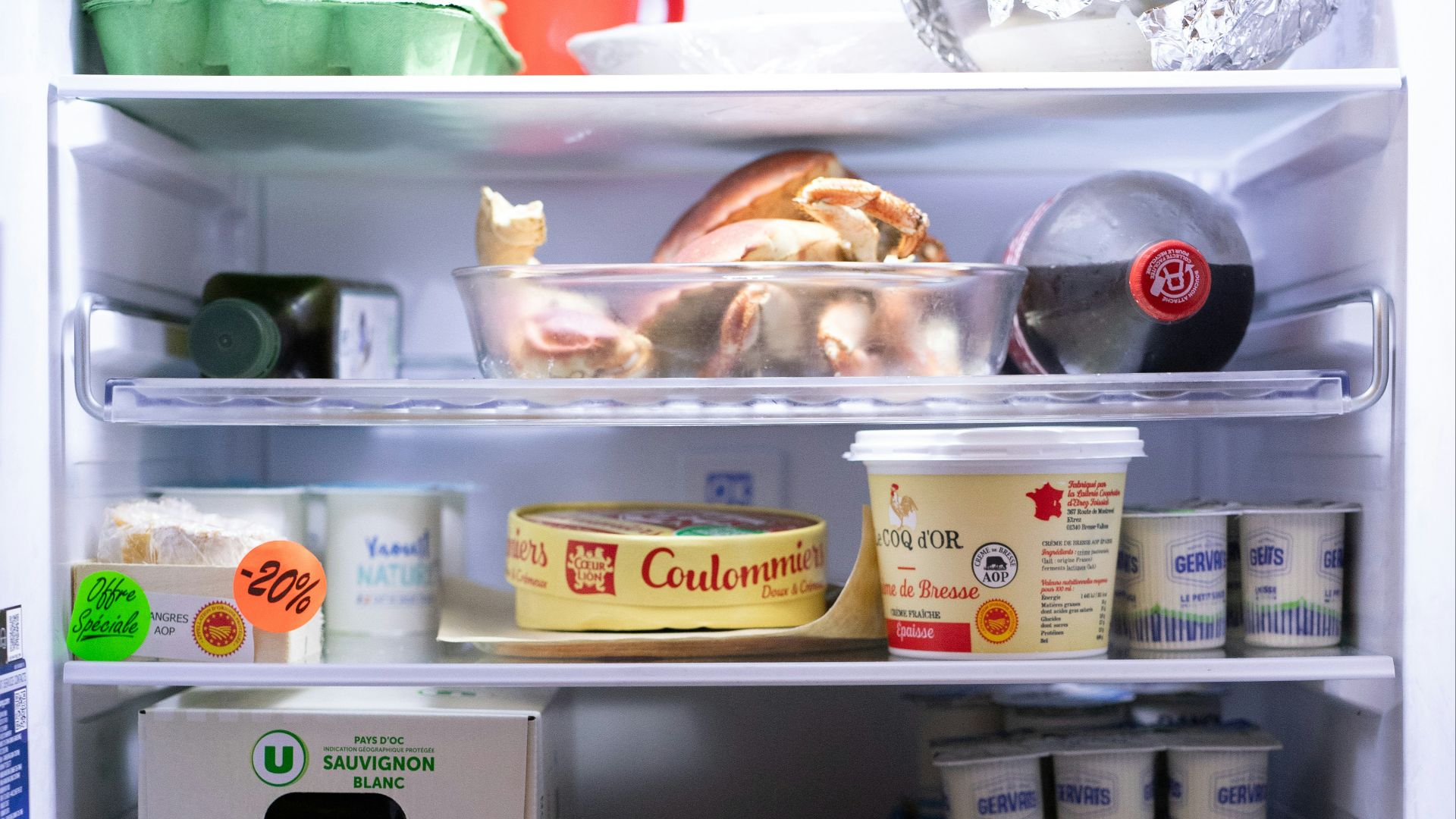 an open refrigerator filled with lots of food