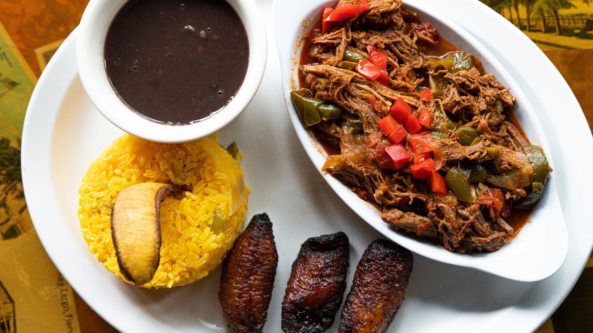 A plate of delicious caribbean food.