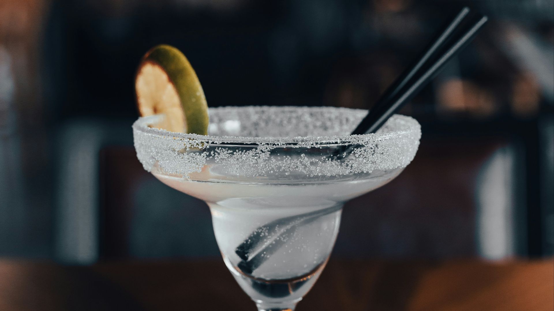 a glass with a drink in it