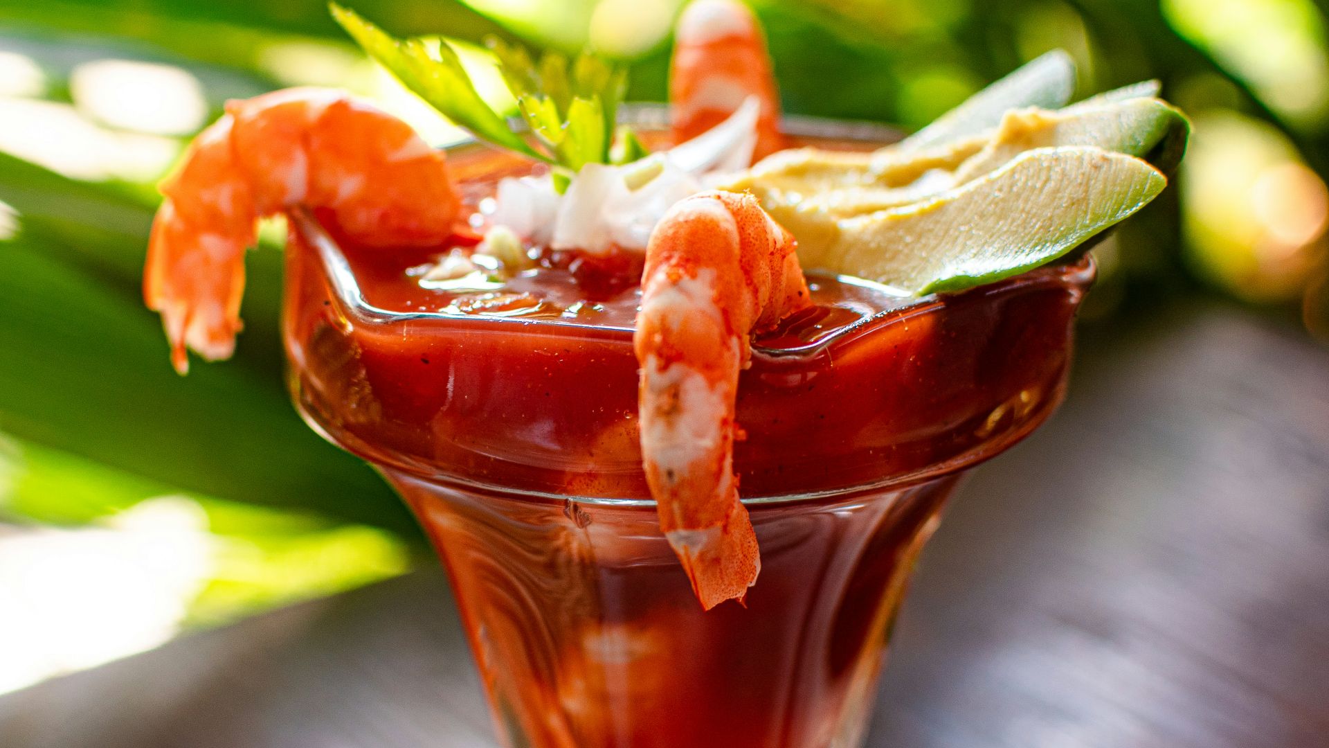 clear drinking glass with red liquid
