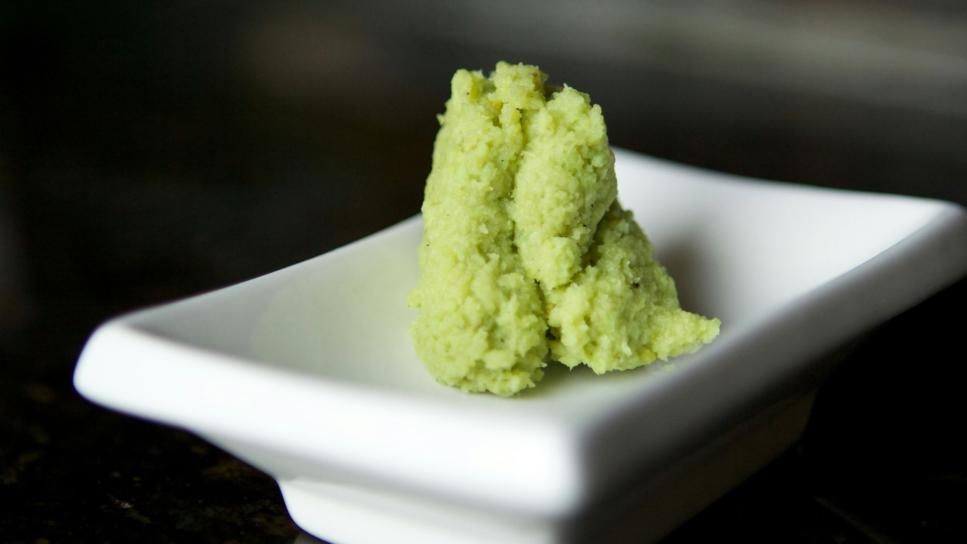 green powder on white ceramic plate