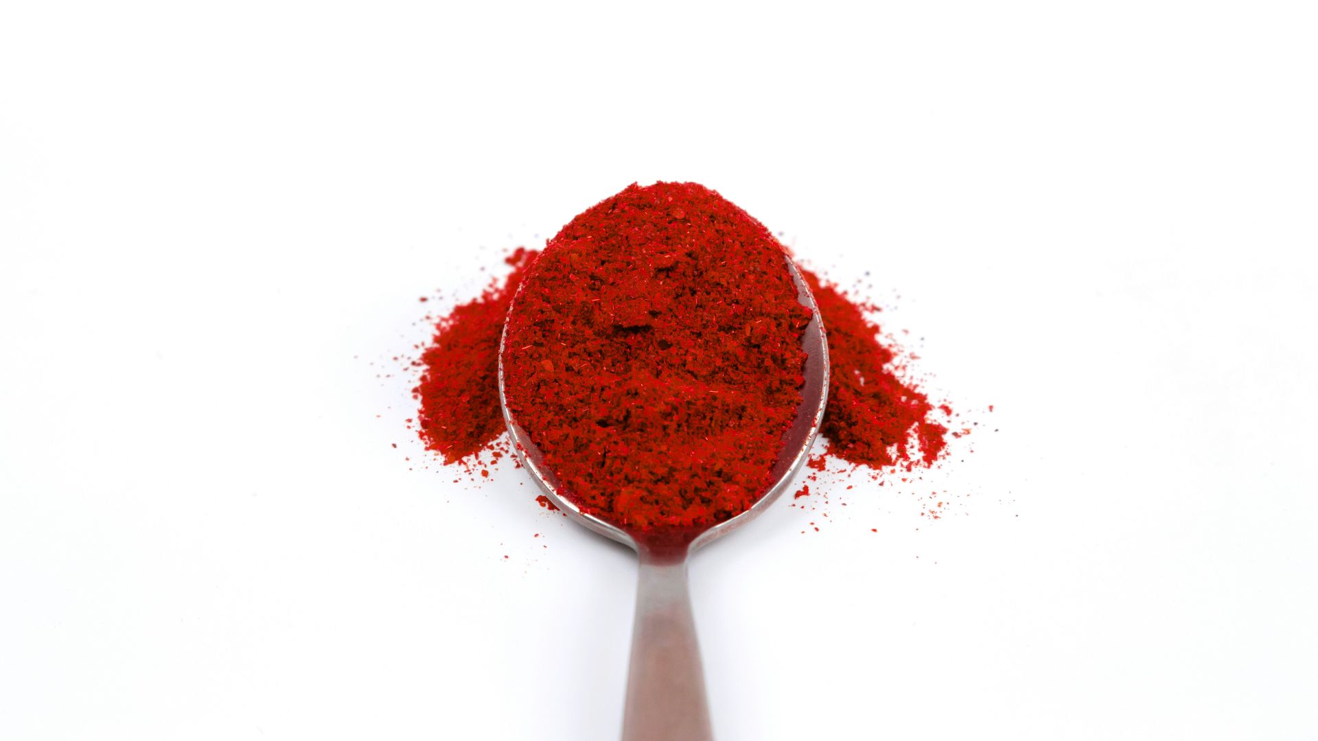 spoon of red powder