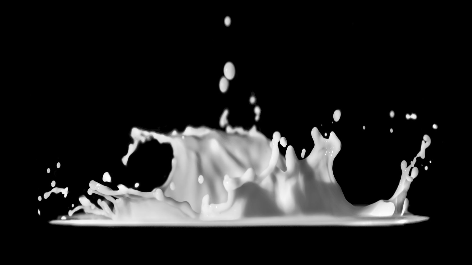 a black and white photo of a liquid splash