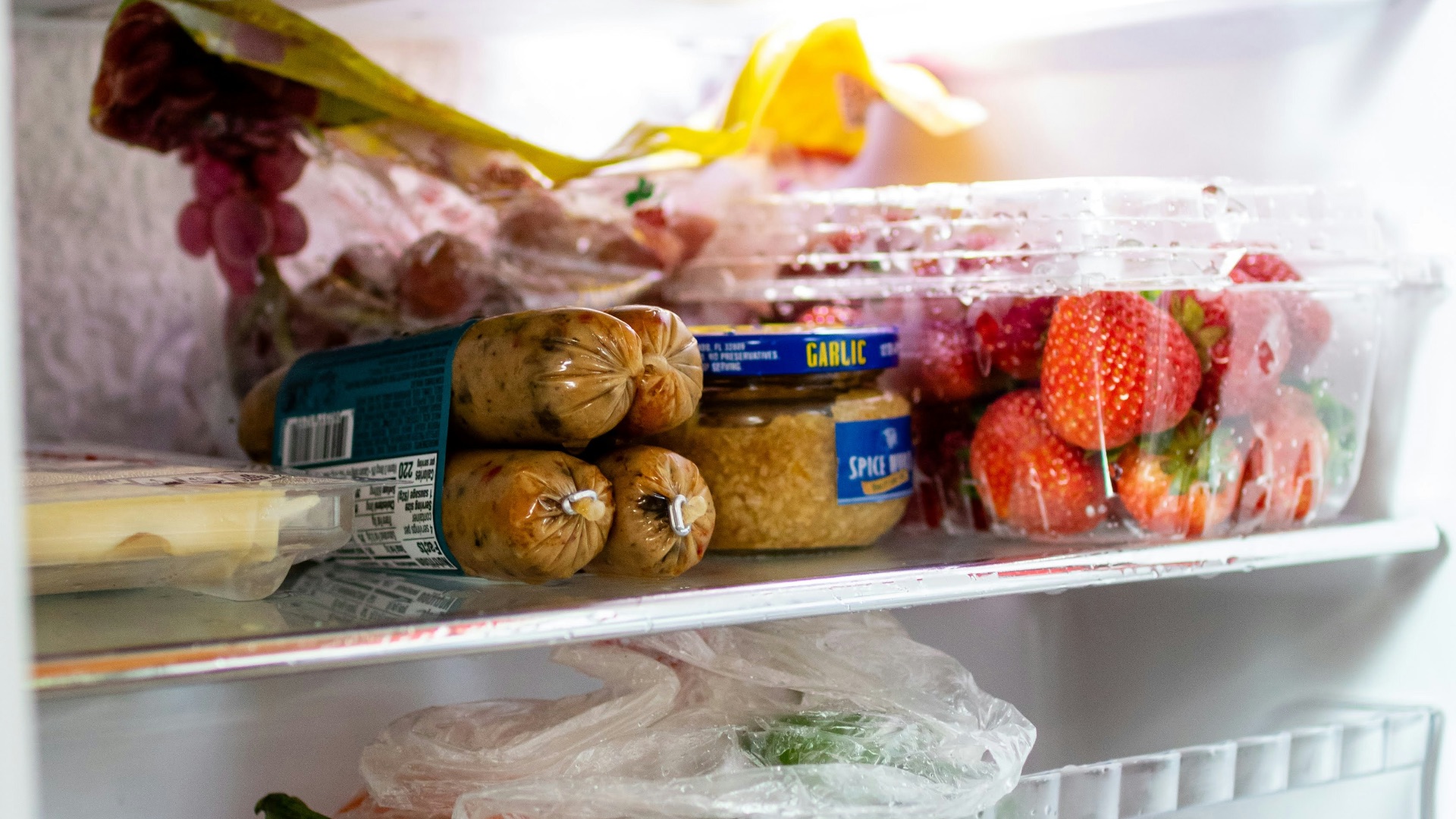a refrigerator filled with lots of food and drinks