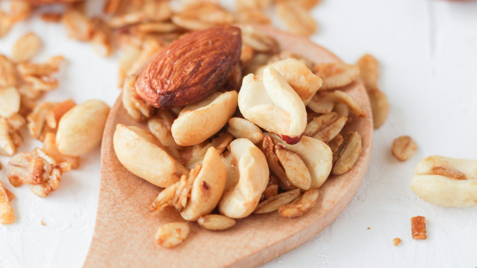 brown wooden spoon with brown and white food