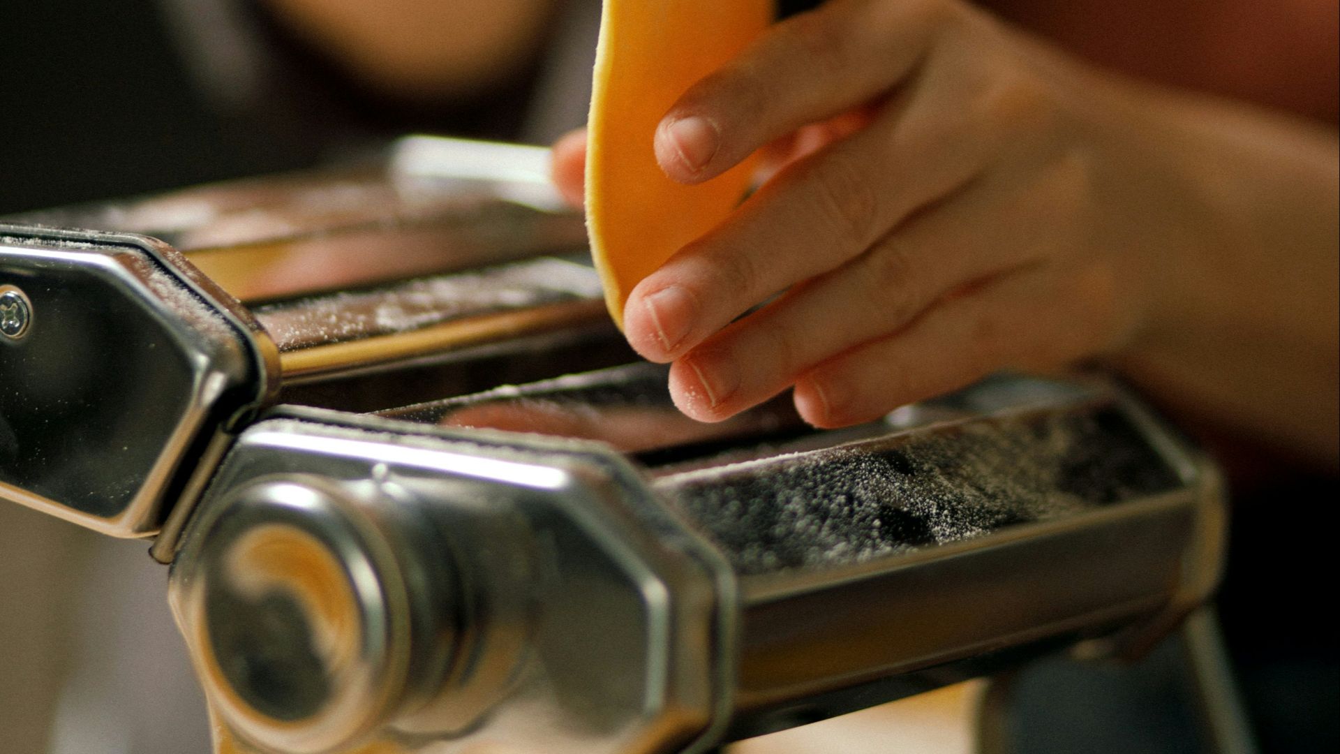 a person is peeling a banana on a machine