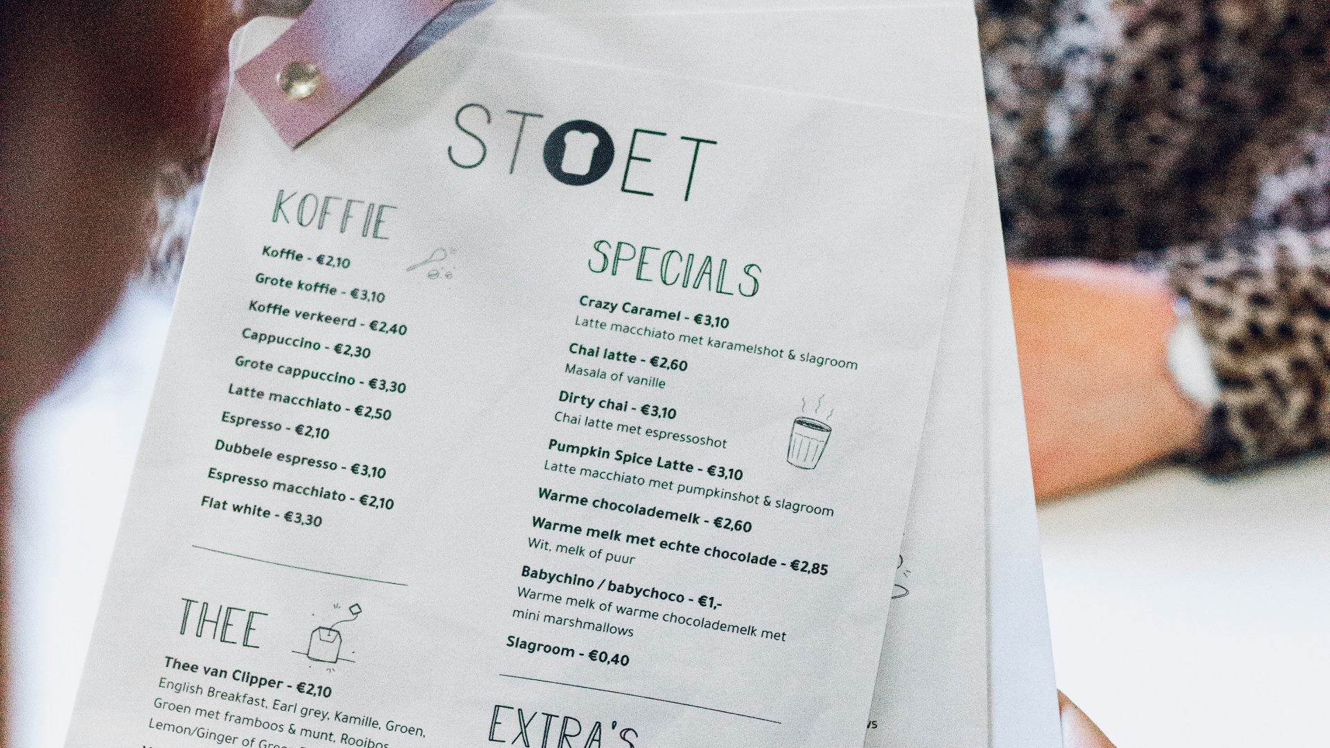 person holding white printer paper