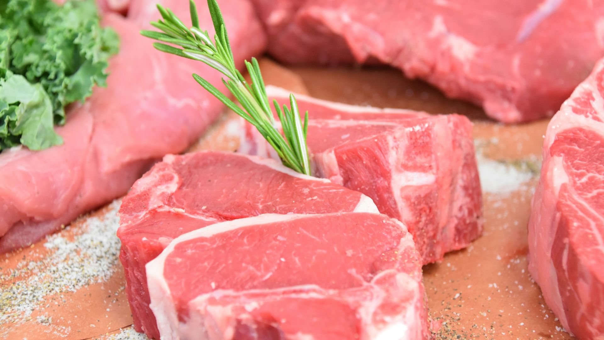 raw meat with green leaves