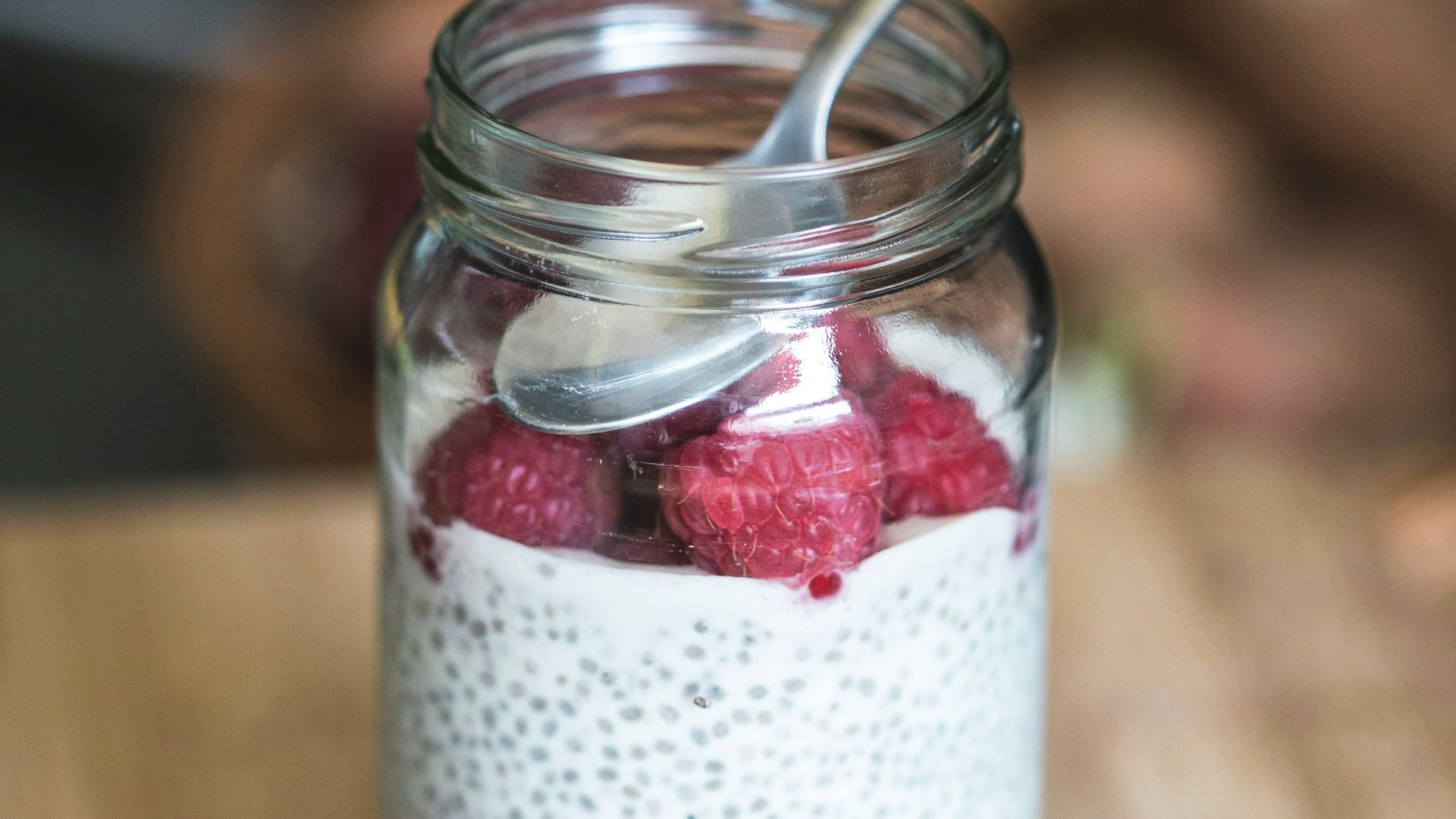 red cherries on clear glass bowl