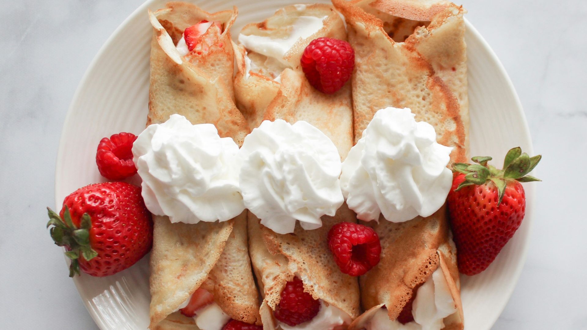 strawberry and banana on white ceramic plate