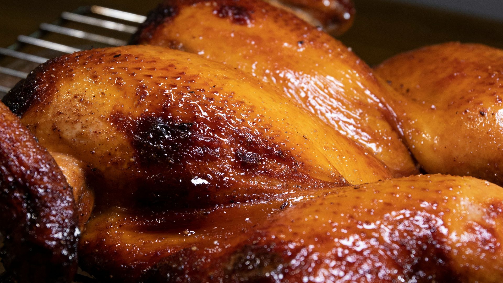 roasted chicken on black metal grill