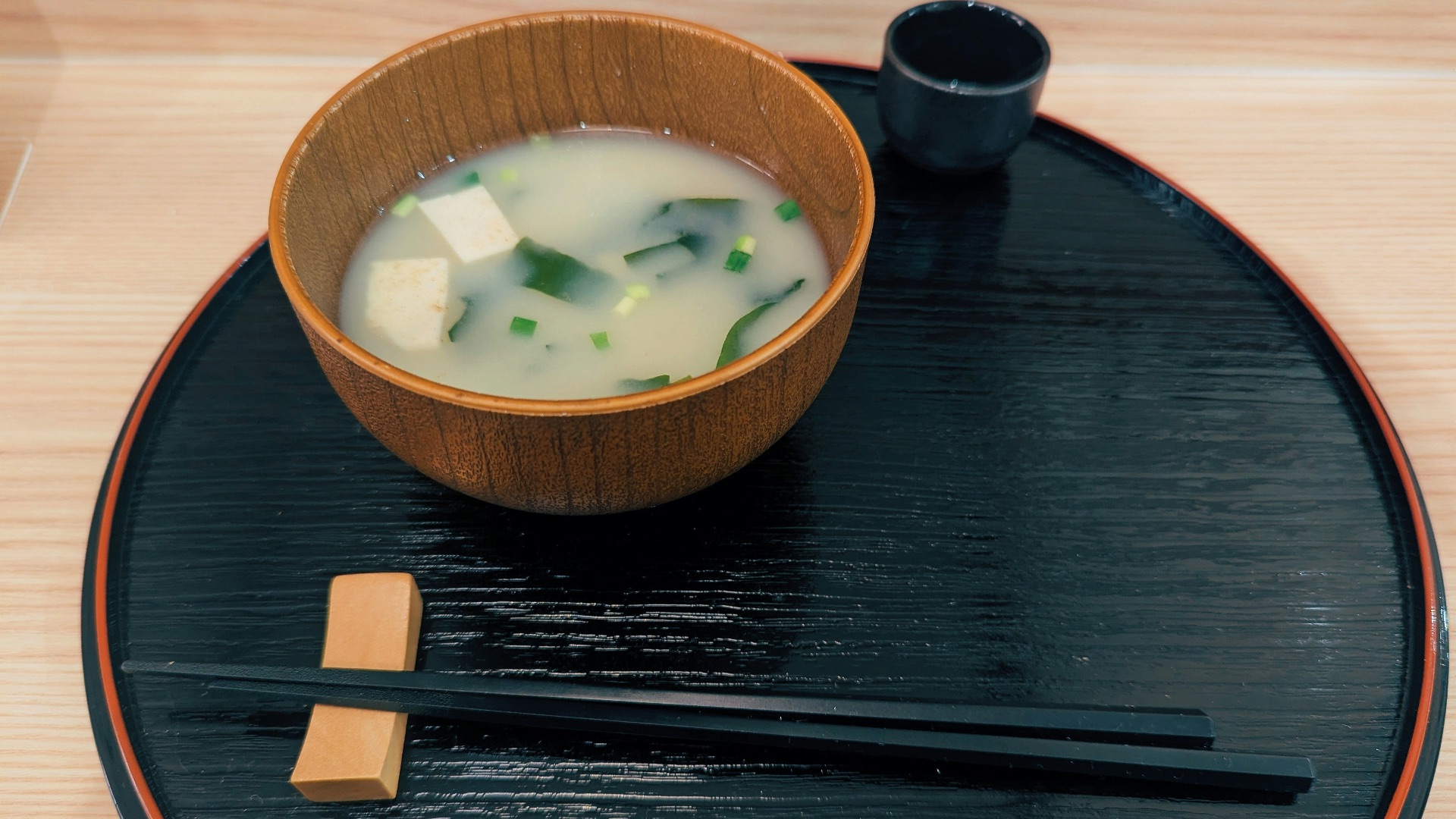 Bowl of miso soup with tofu and seaweed