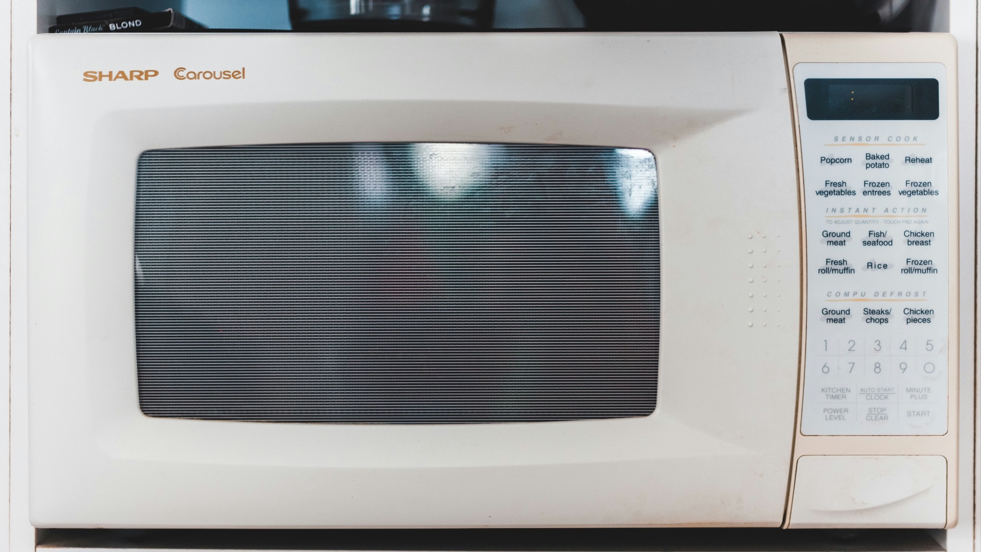 white microwave oven turned off