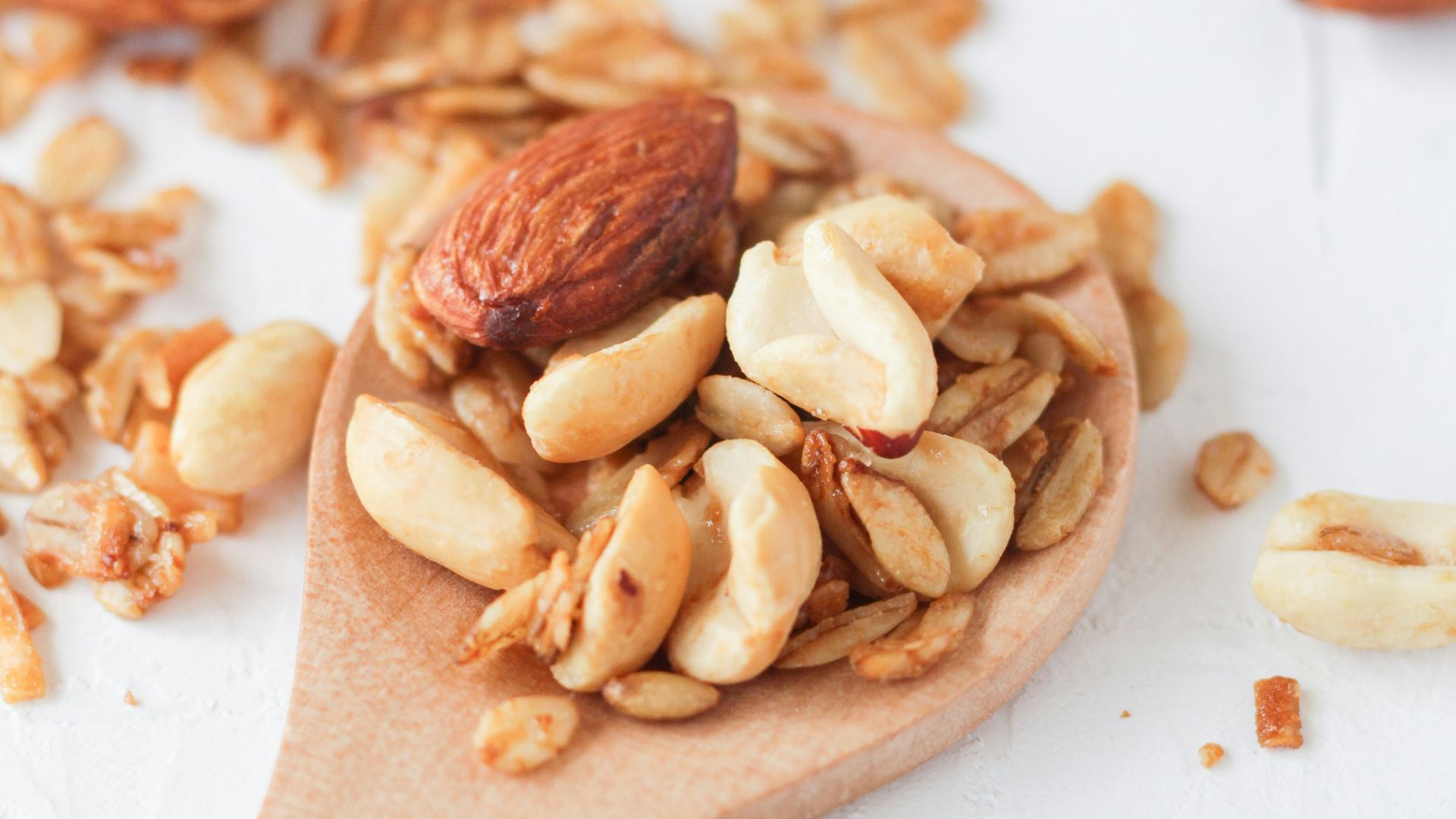brown wooden spoon with brown and white food