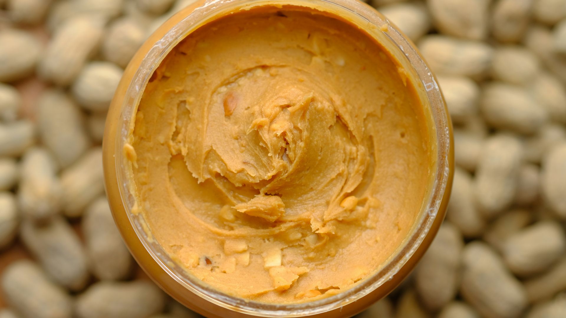 brown powder in brown round container