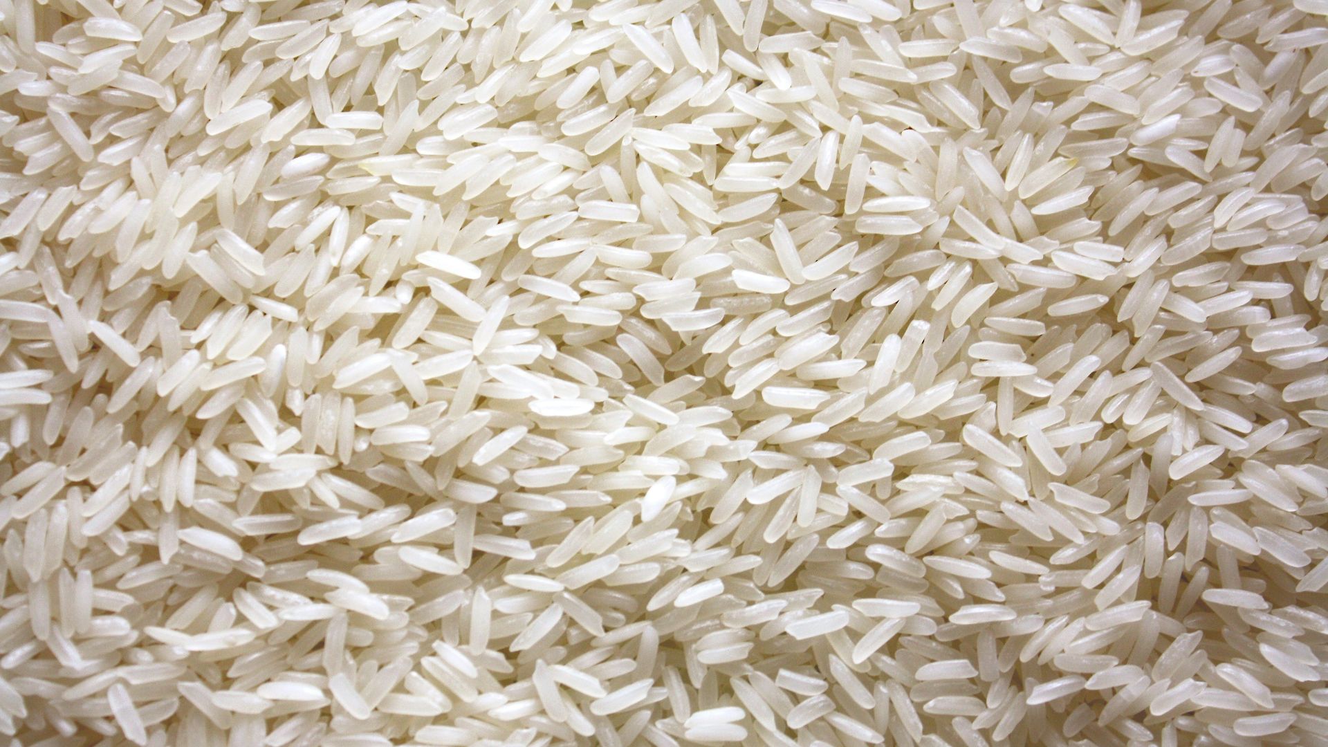 a pile of white rice sitting on top of a table
