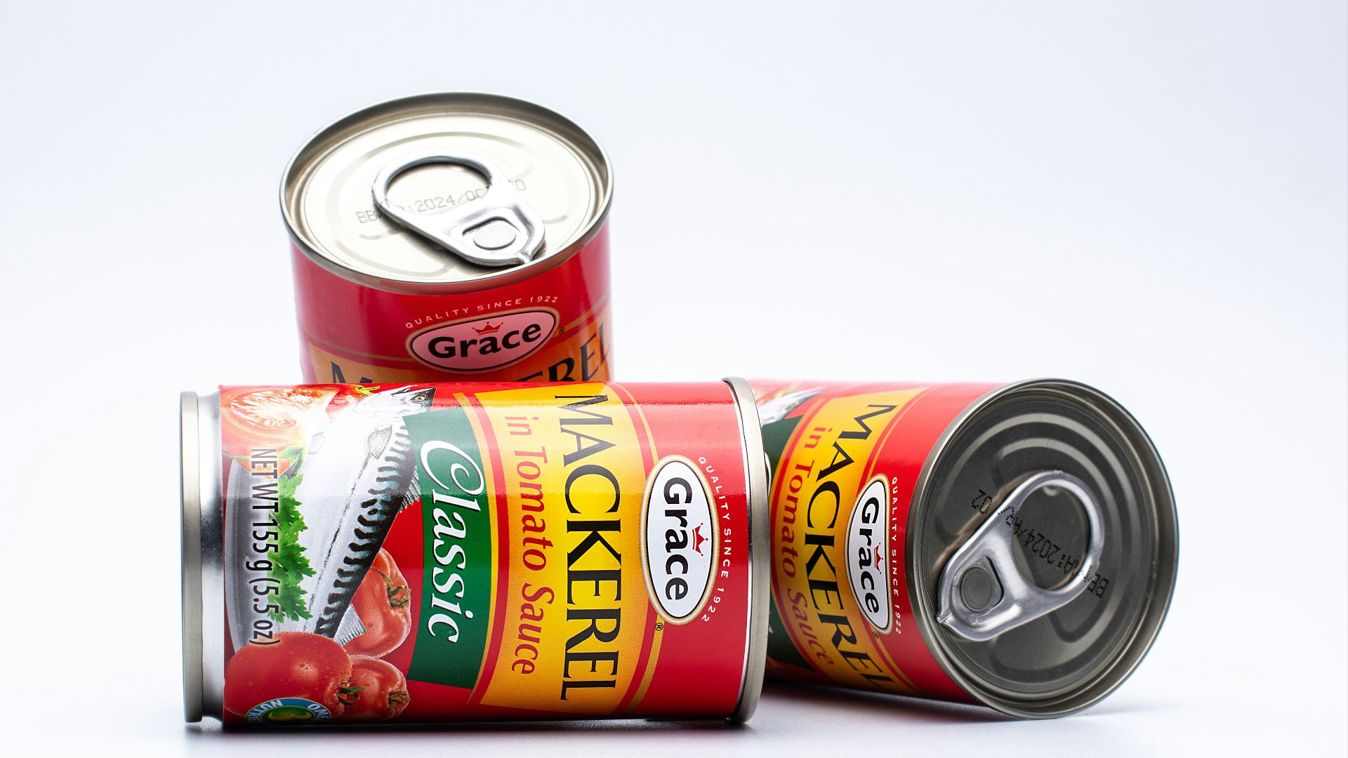 two cans of canned food sitting next to each other