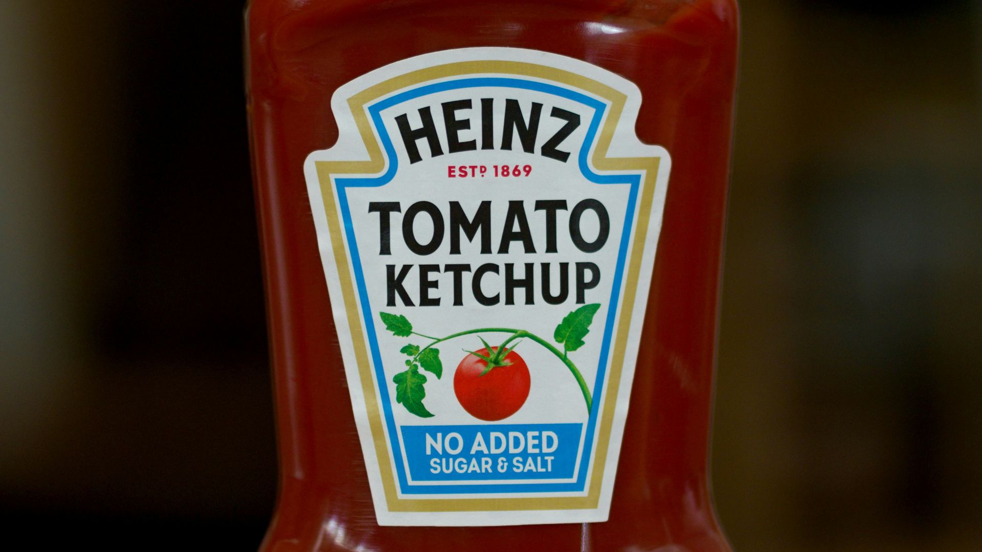 heinz tomato ketchup bottle on brown wooden table