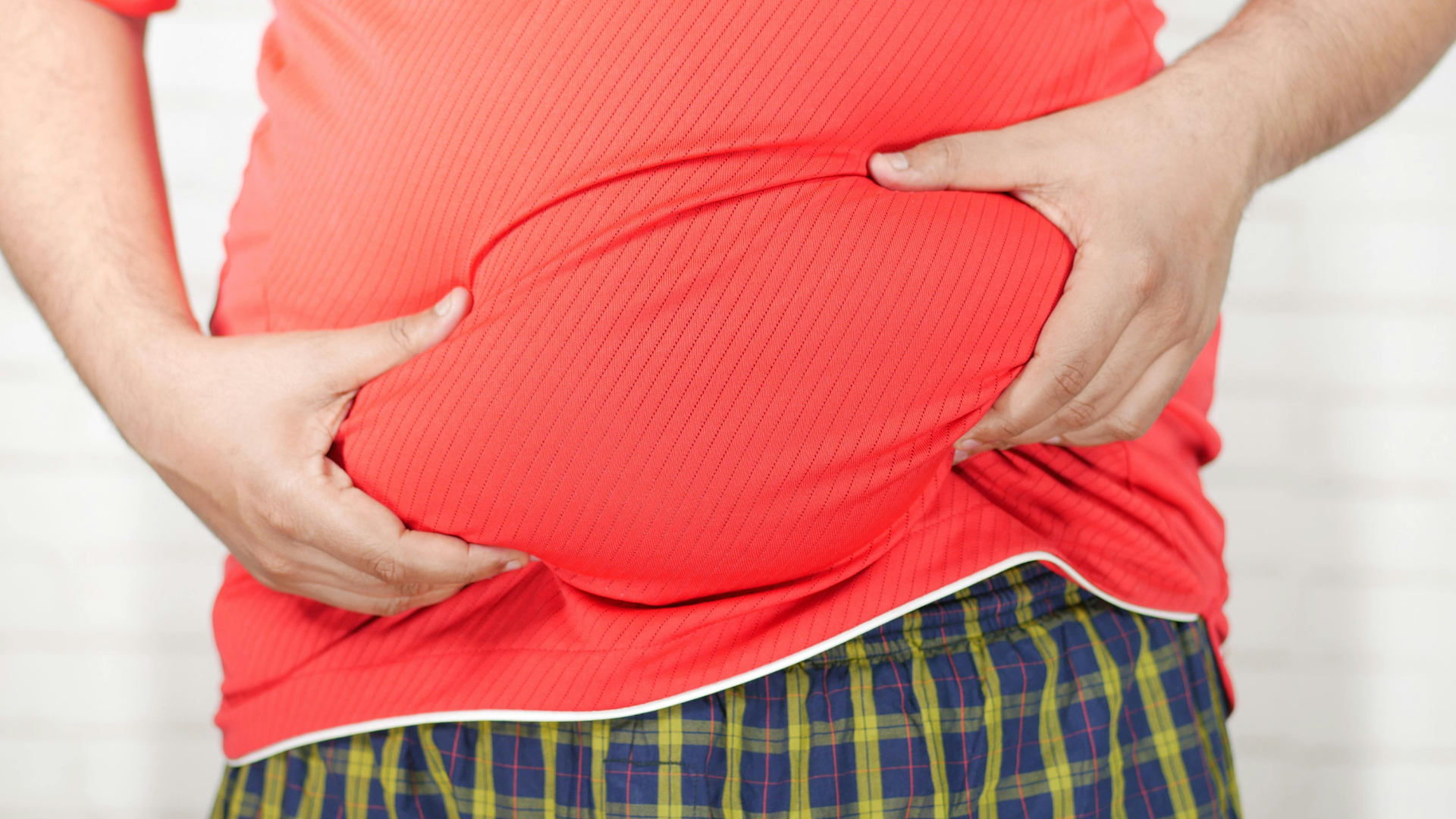 man_holding_gut_thumb_rss.png