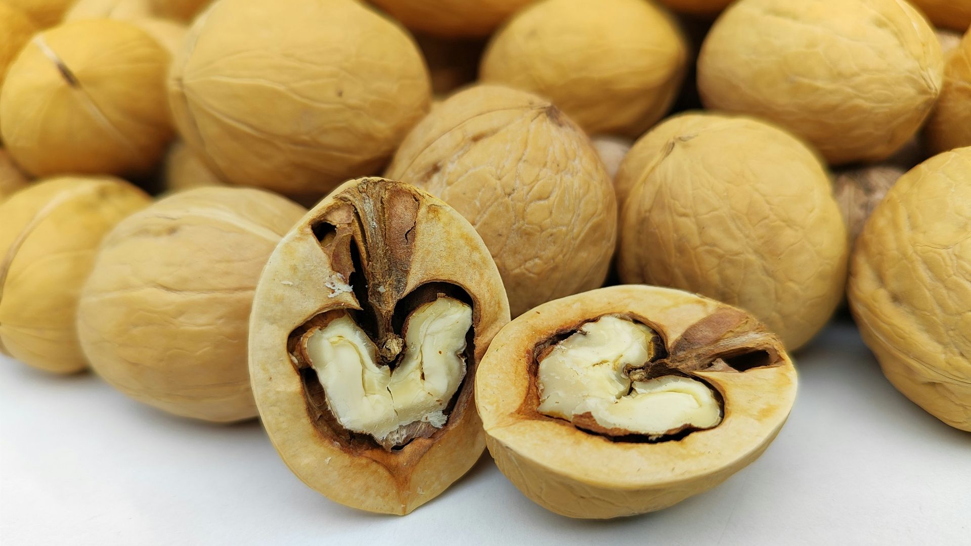 a bunch of nuts sitting next to each other